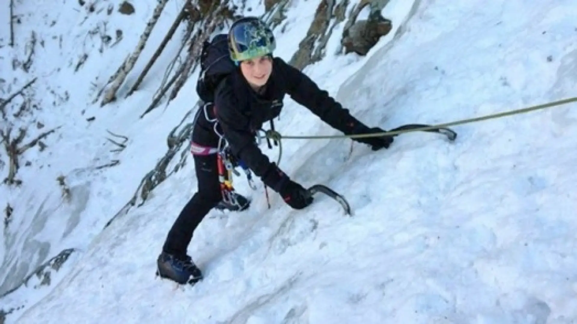 Girl Ice Climbing
