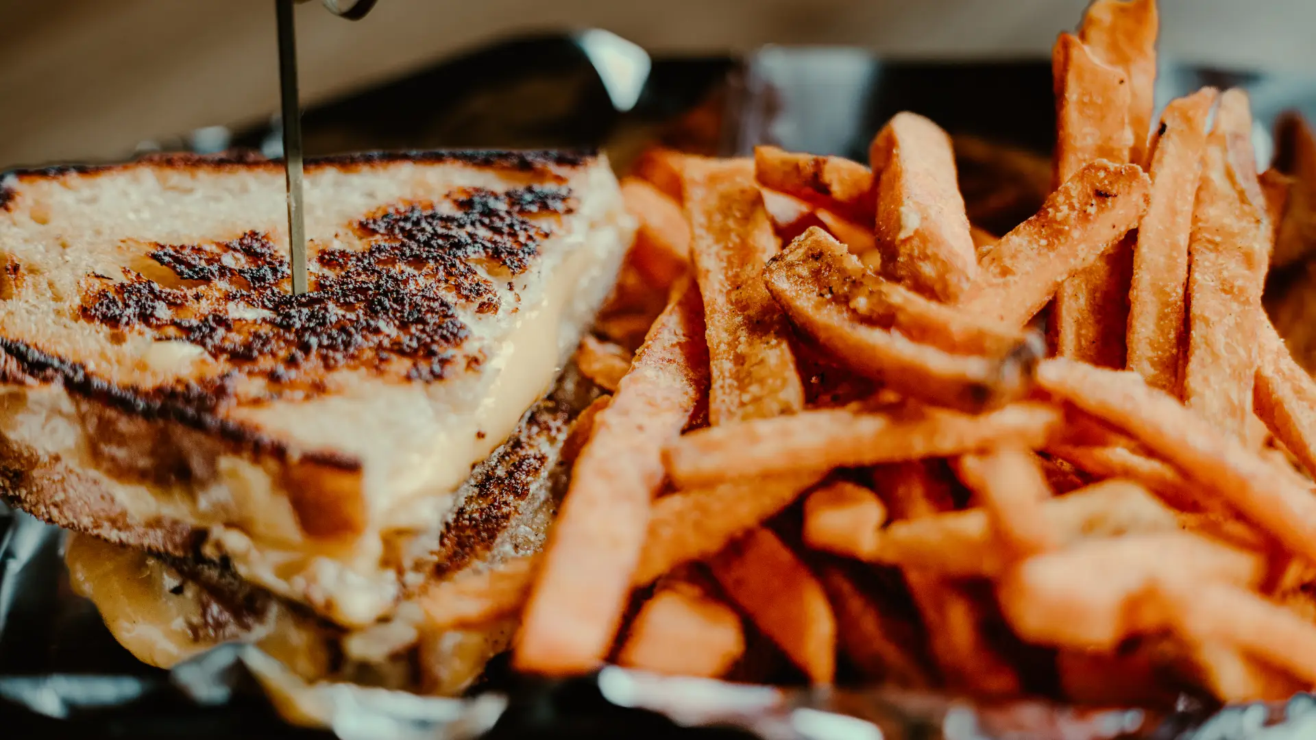 A perfectly grilled cheese and potato fries.  Photo Credit to A. Kelly.