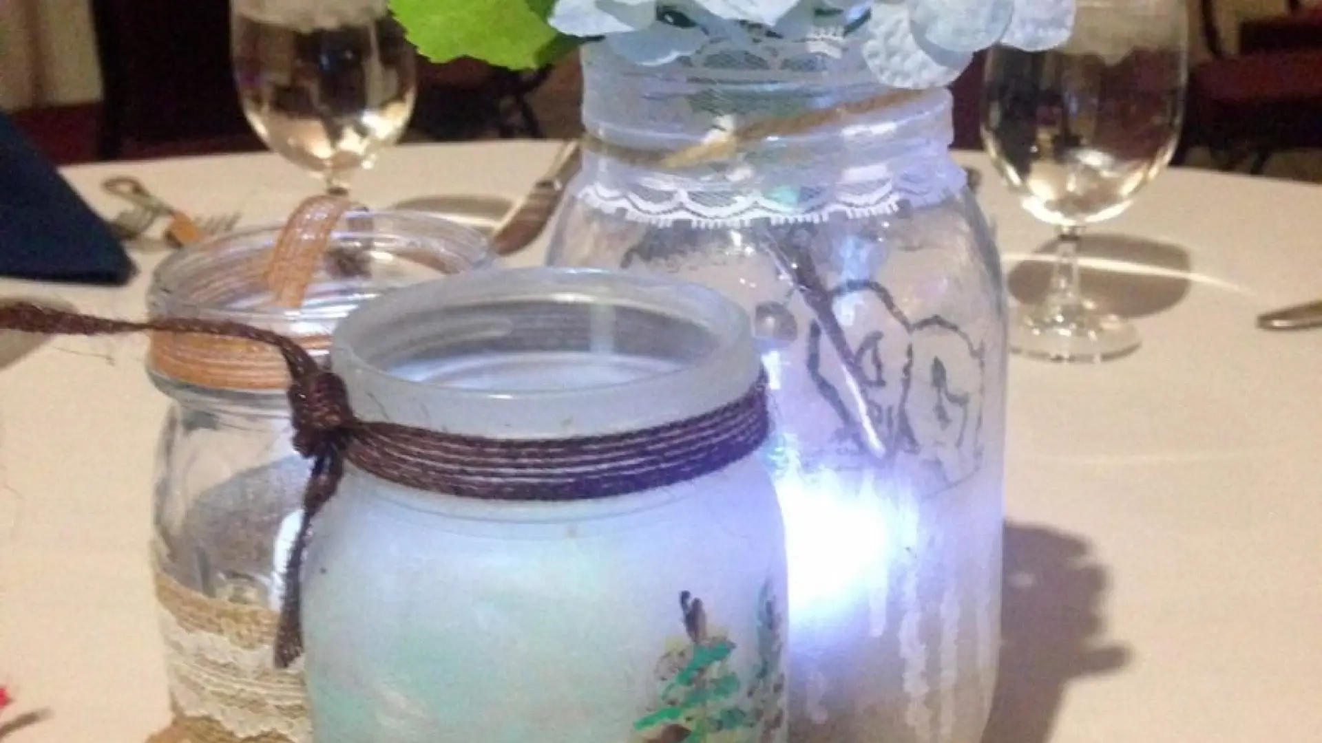 Homemade Adirondack style centerpieces on every table