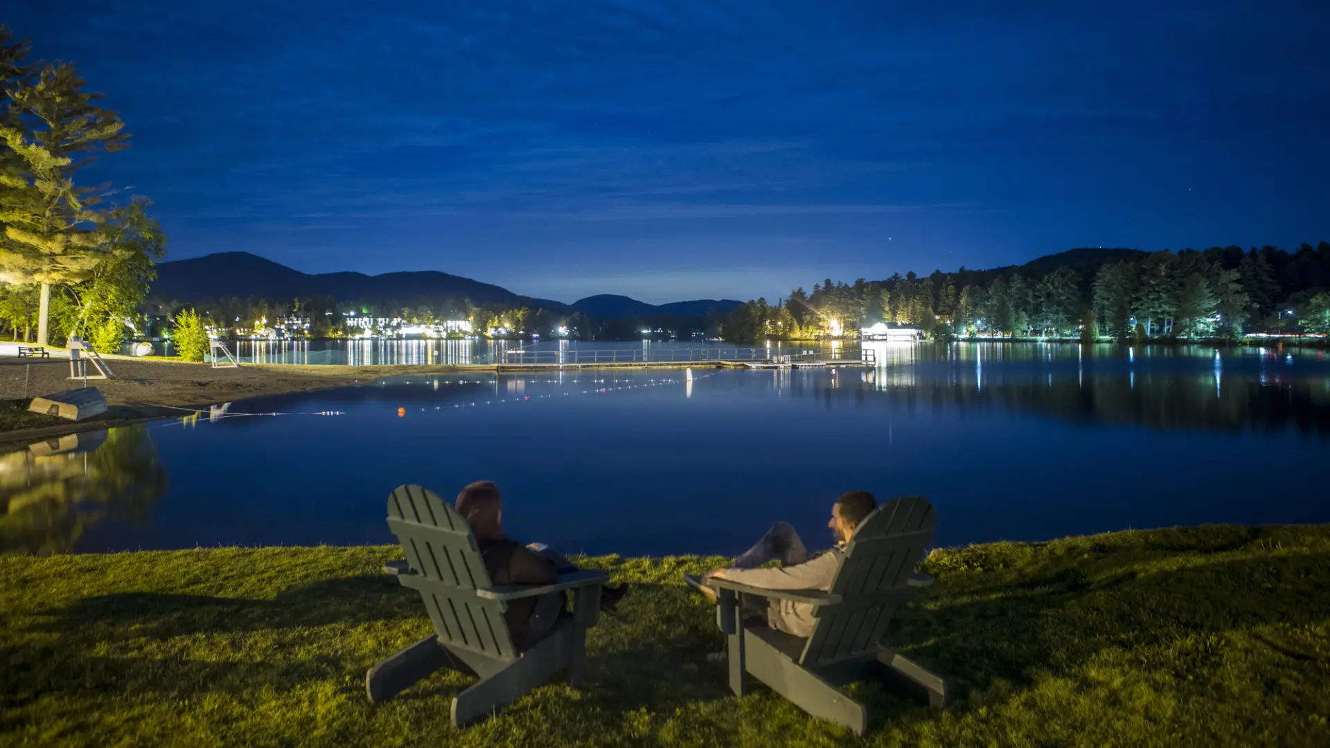 A view of reflections on Mirror Lake at nighttime