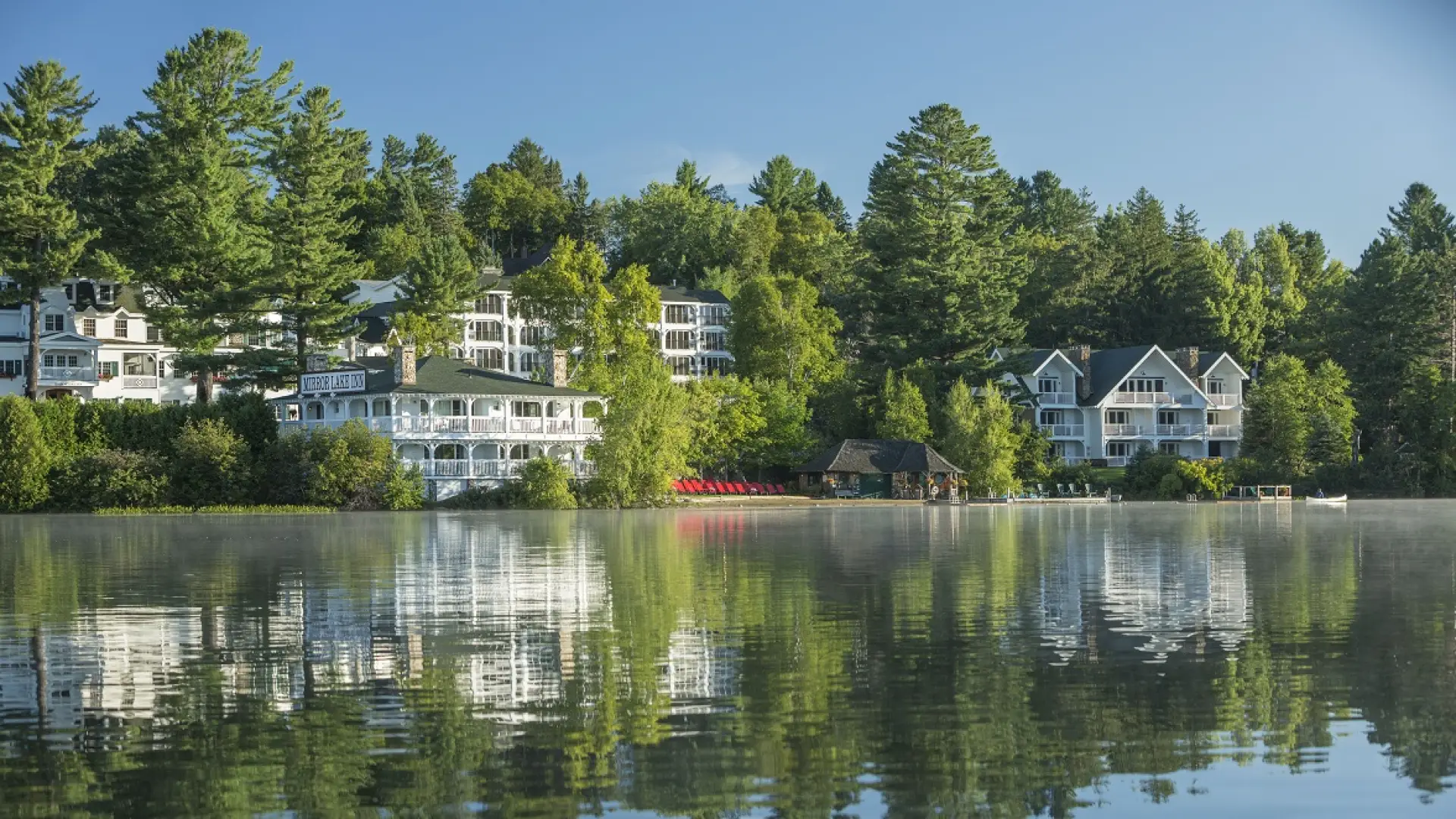 A view of the Mirror Lake Inn from the waters of Mirror Lake