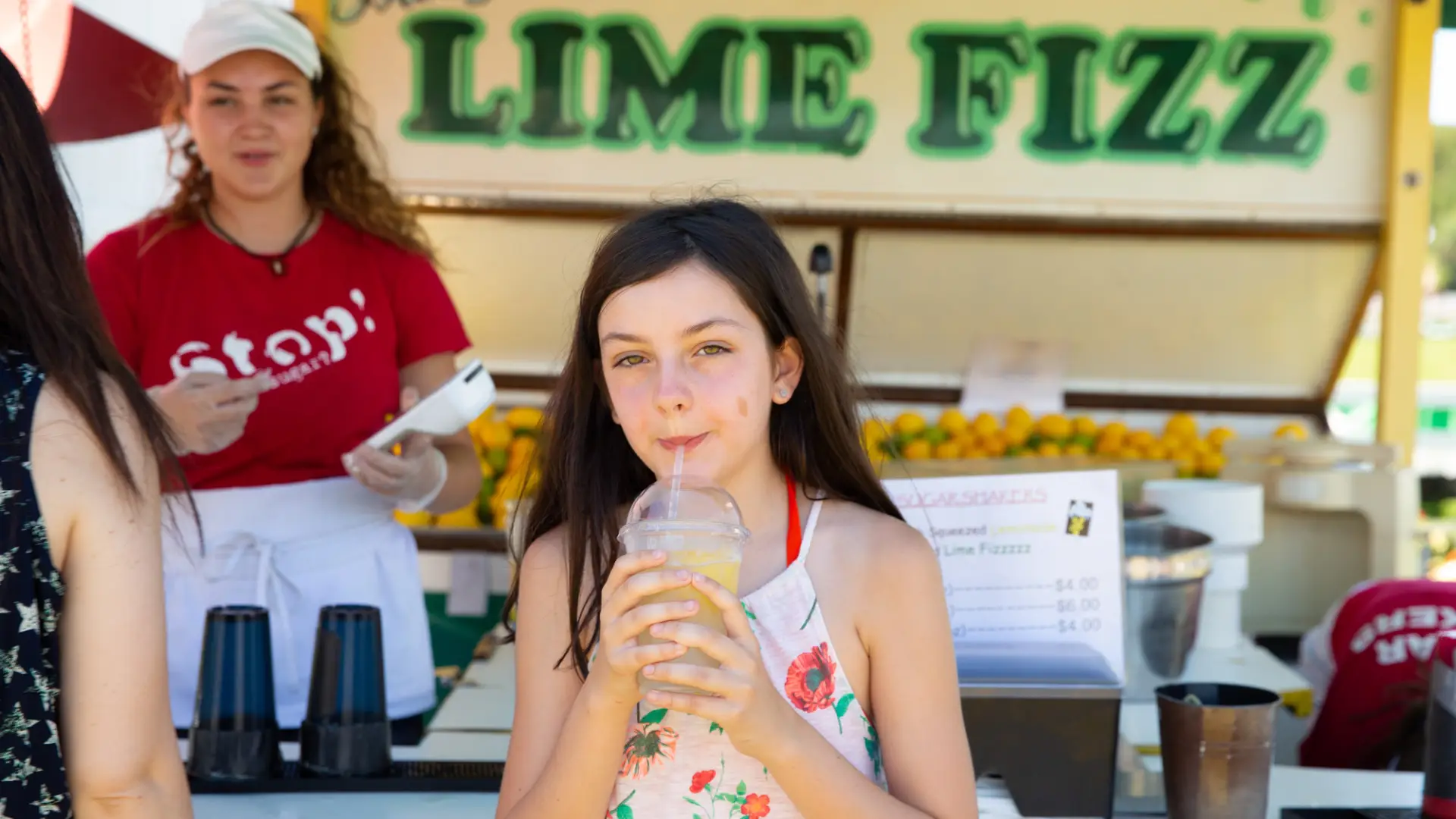 Child enjoys lemonade at the Lake Placid Horse Show