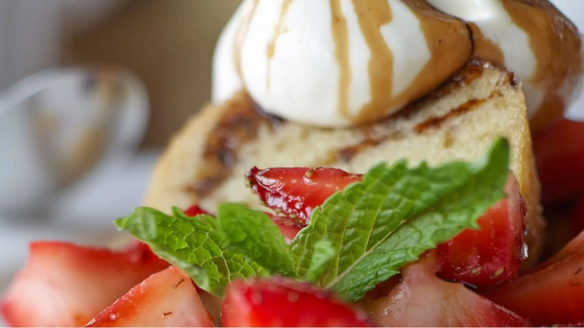 Always have dessert!  Delicious cake topped with ice cream and strawberries