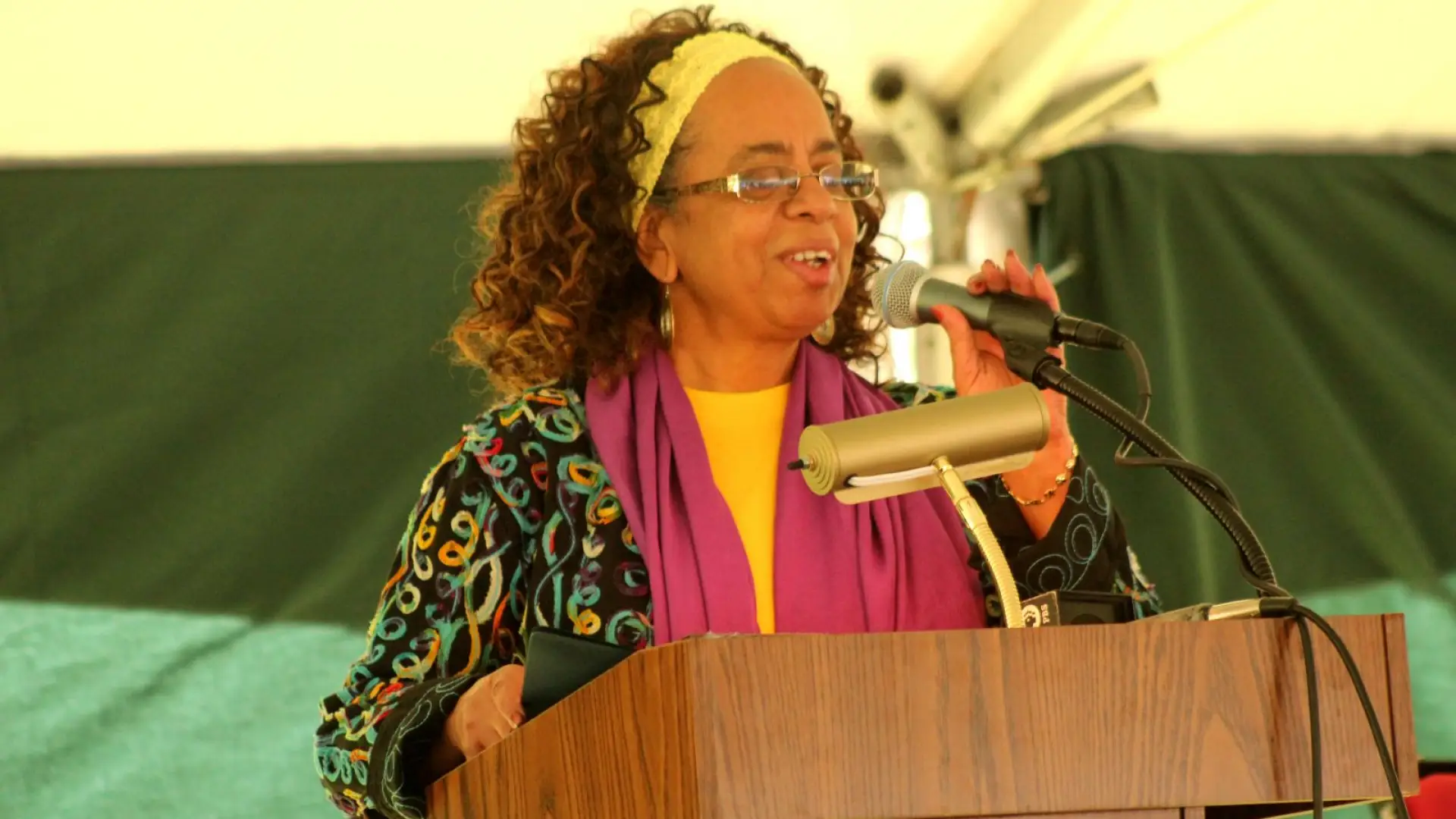 Cherrie Burgess accepts a John Brown Freedom Award on behalf of her late husband, Brother Yusuf Abdul-Wasi.
