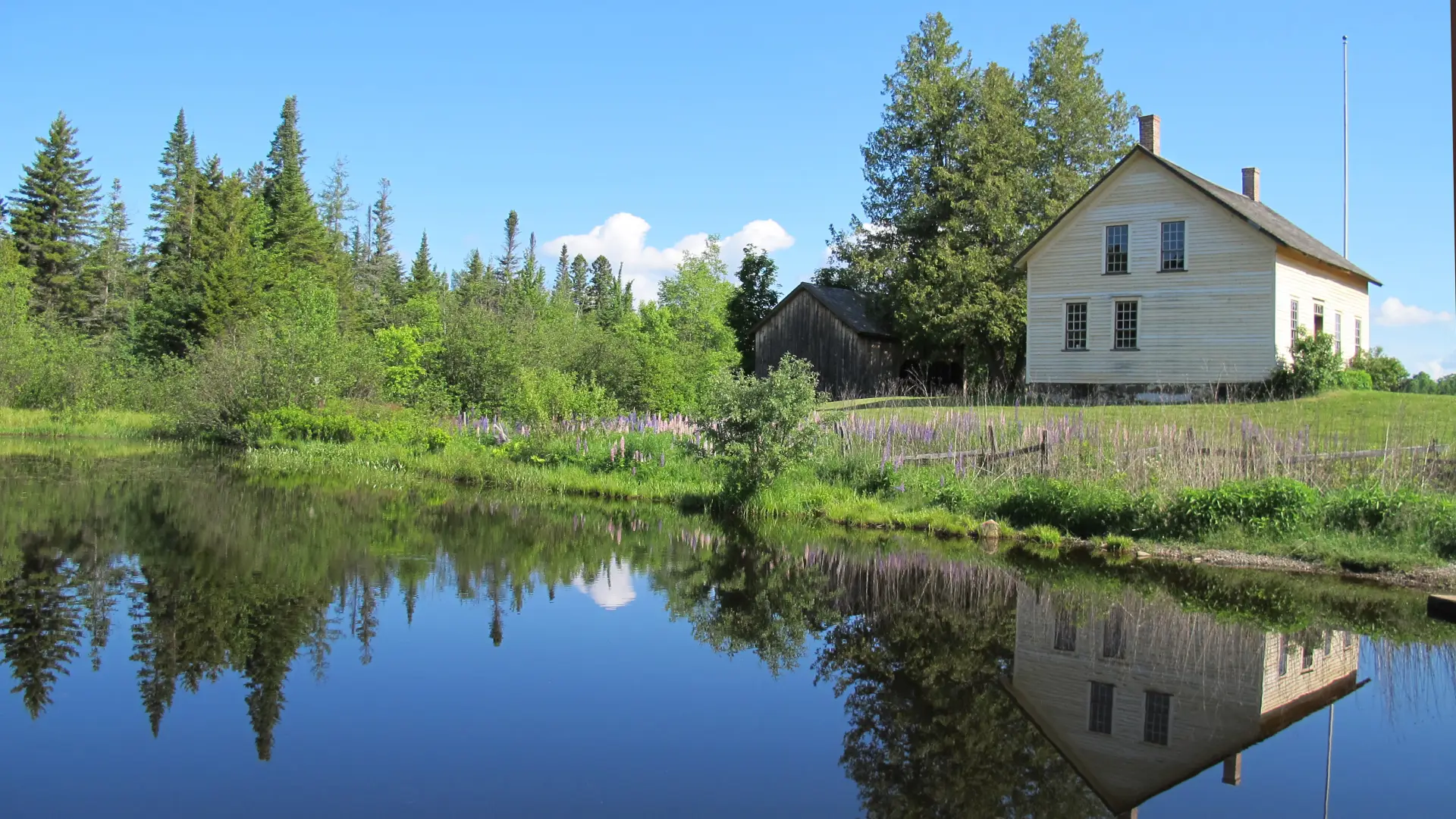 The original house and pond are still on the site.