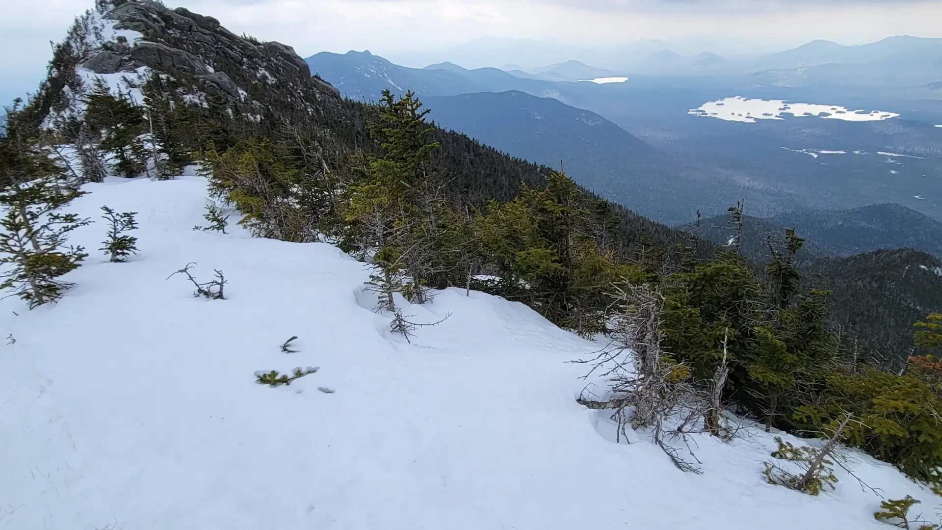 A pointy mountain summit in the winter