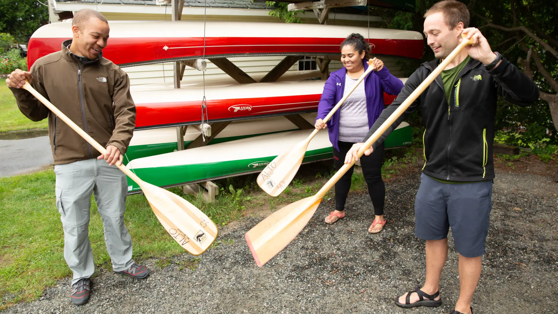 A guide teaches clients how to paddle