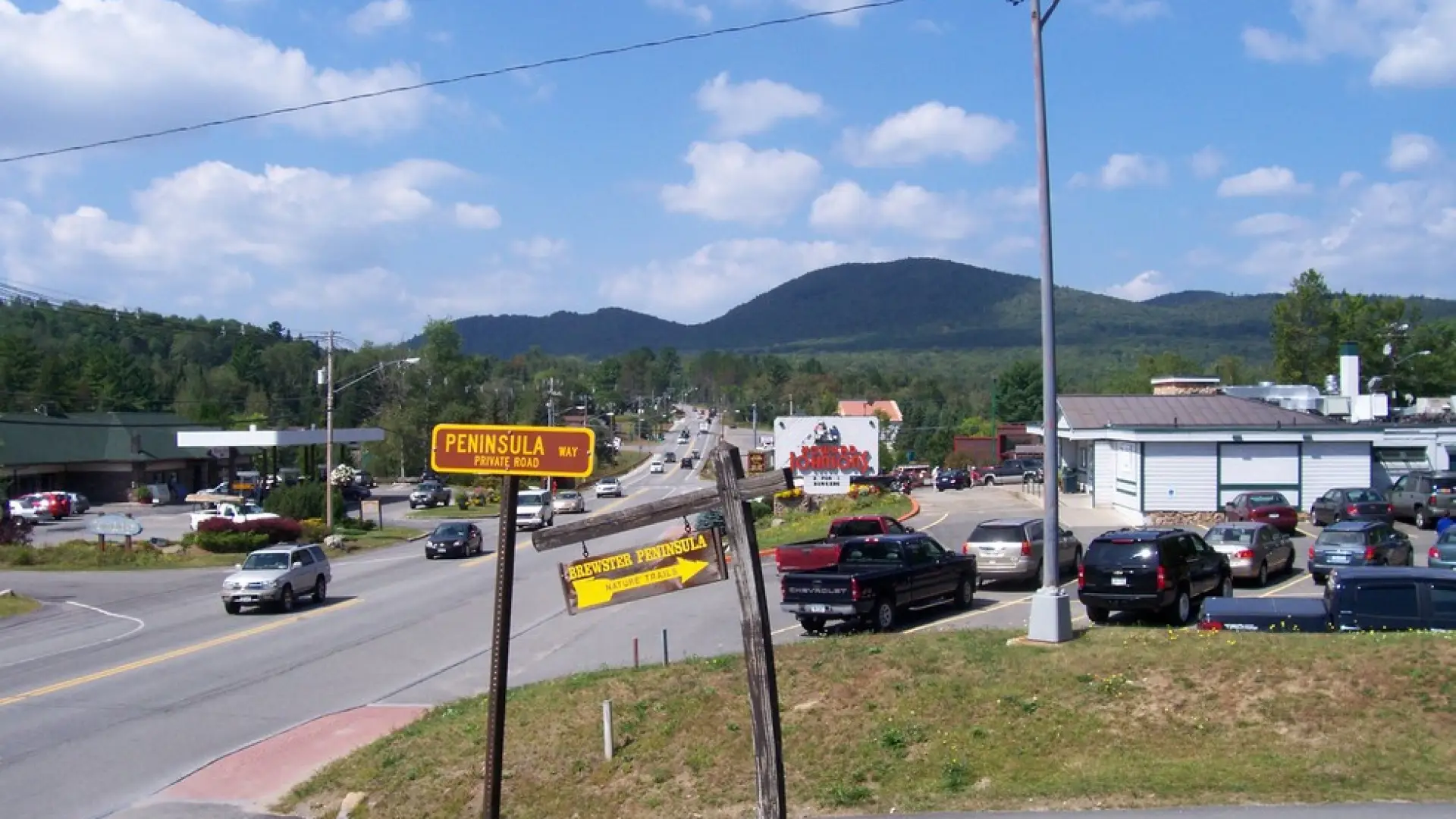 Coming from downtown on Route 86 West, the sign for the drive.
