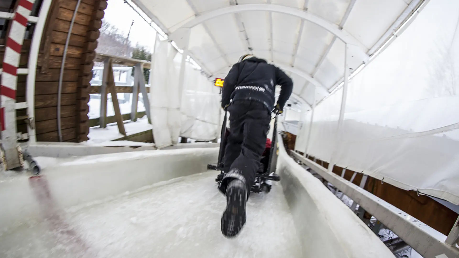Bobsled ride heading down the start ramp