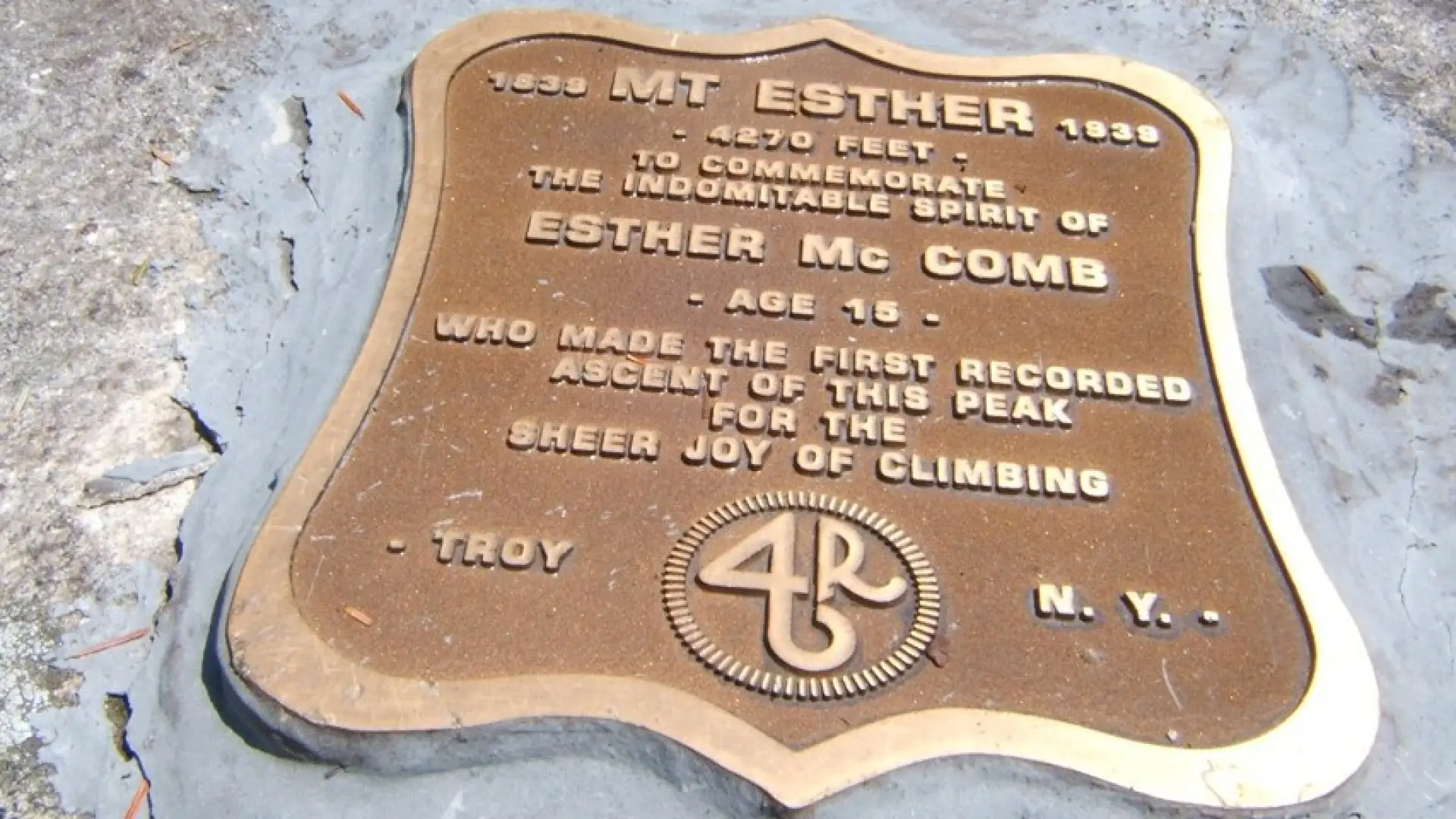 This commemorative placque celebrates the bold young woman who was the first to summit.