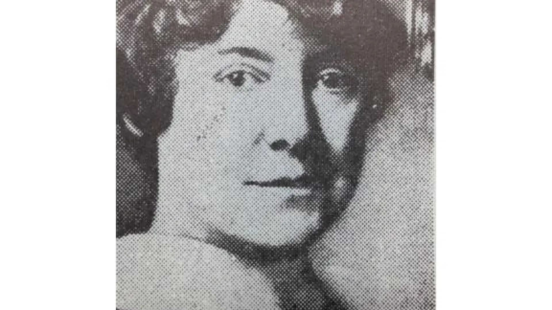 A portrait of Mabel Smith Douglass in black and white.