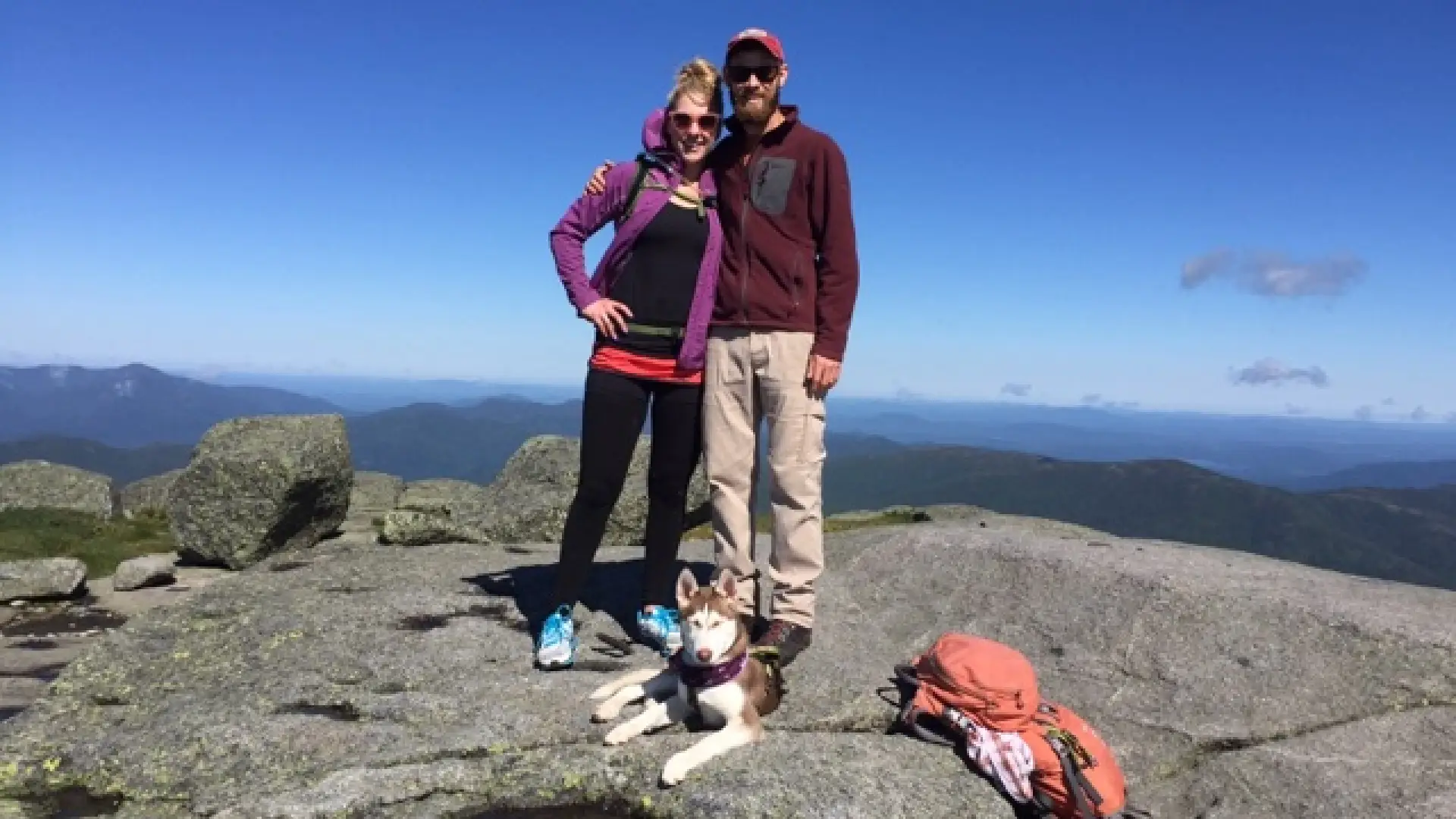 Proud parents at the summit of Algonquin Mountain with Shoka.