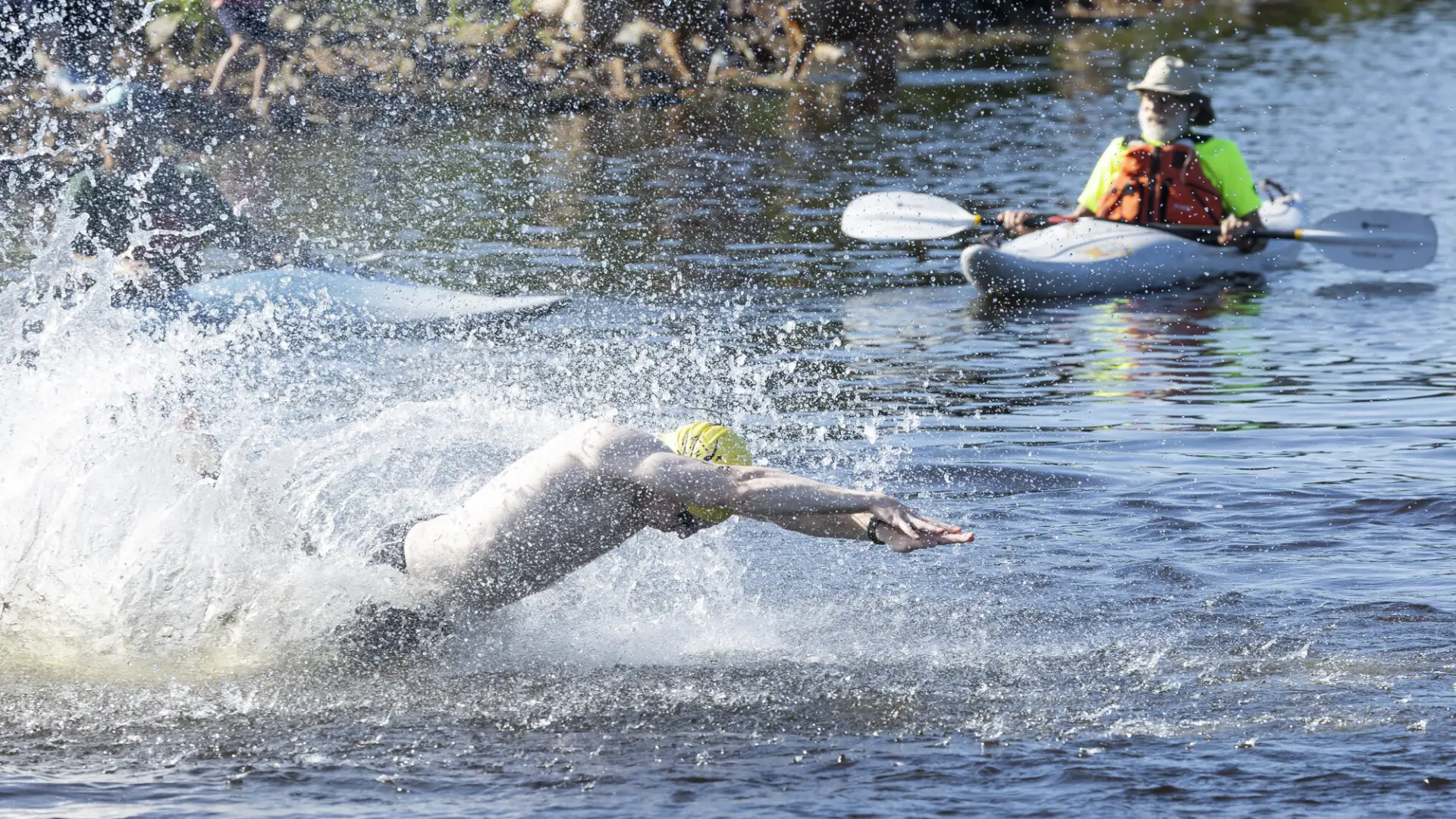 Tinman athlete dives into Raquette Pond