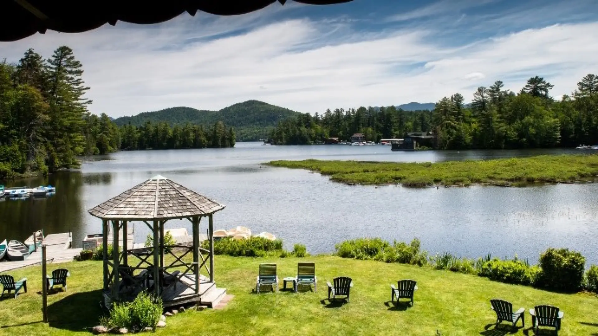 Chairs on the lawn by the lake.