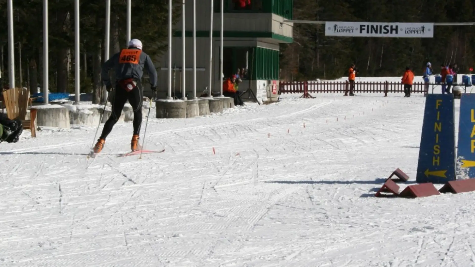 A competitor finishes the grueling Lake Placid Loppet