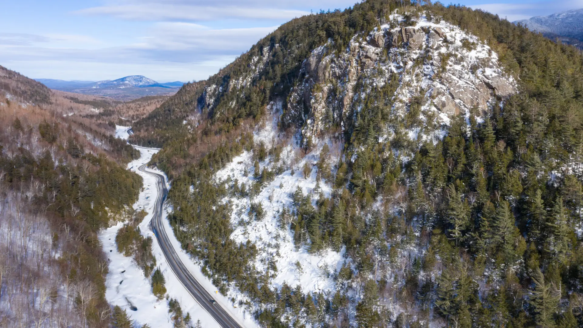 A road runs through a mountain pass.