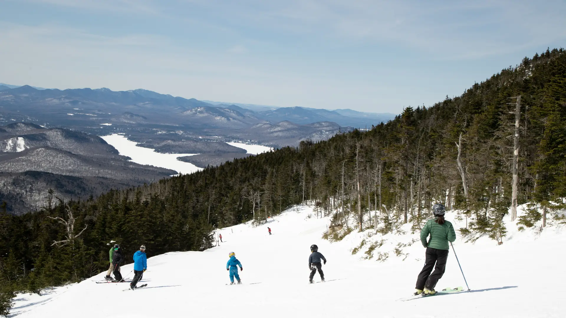 A family with small children ski at Whiteface.