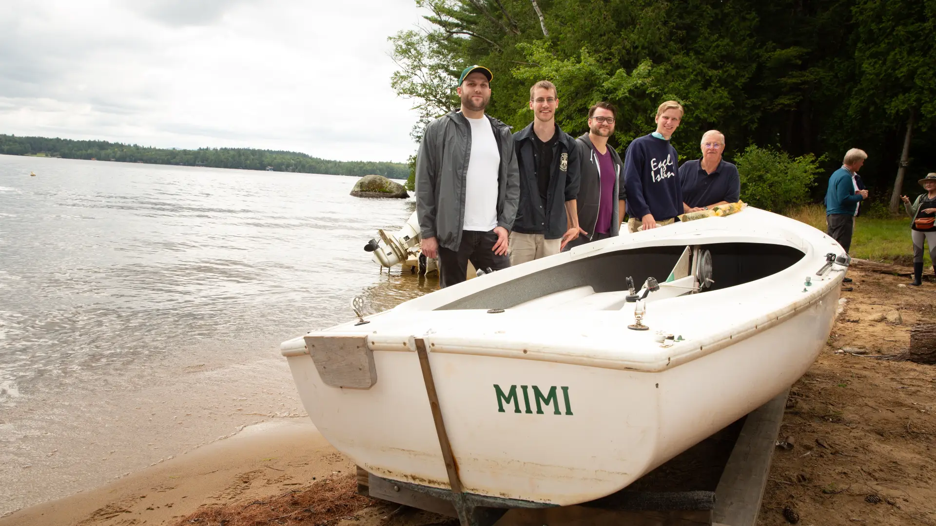 This group at Eagle Camp shows the scenic and boating possibilities of island camping.