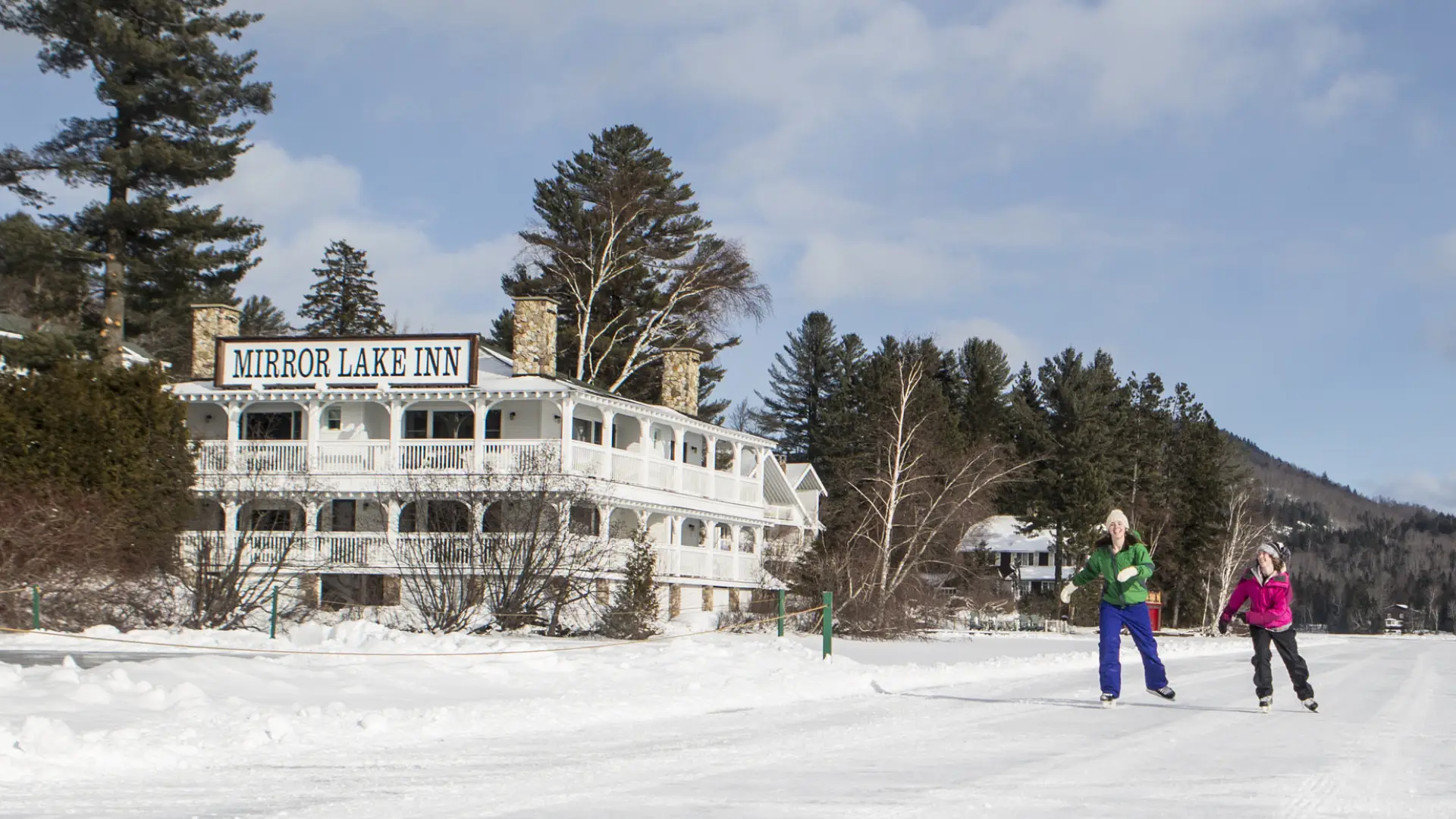 Skating on Mirror Lake in from of the Mirror Lake Inn