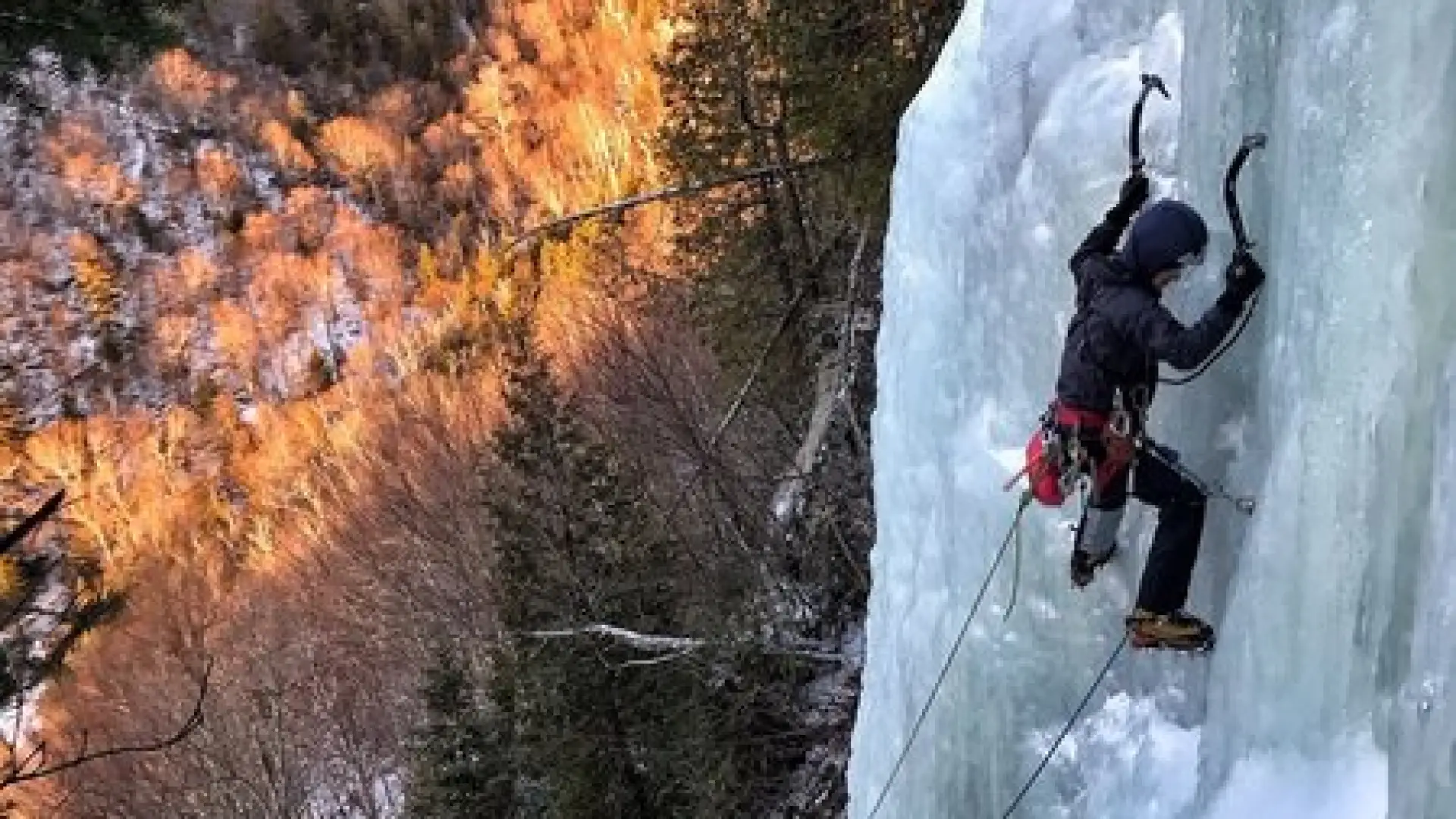An ice climber leading.