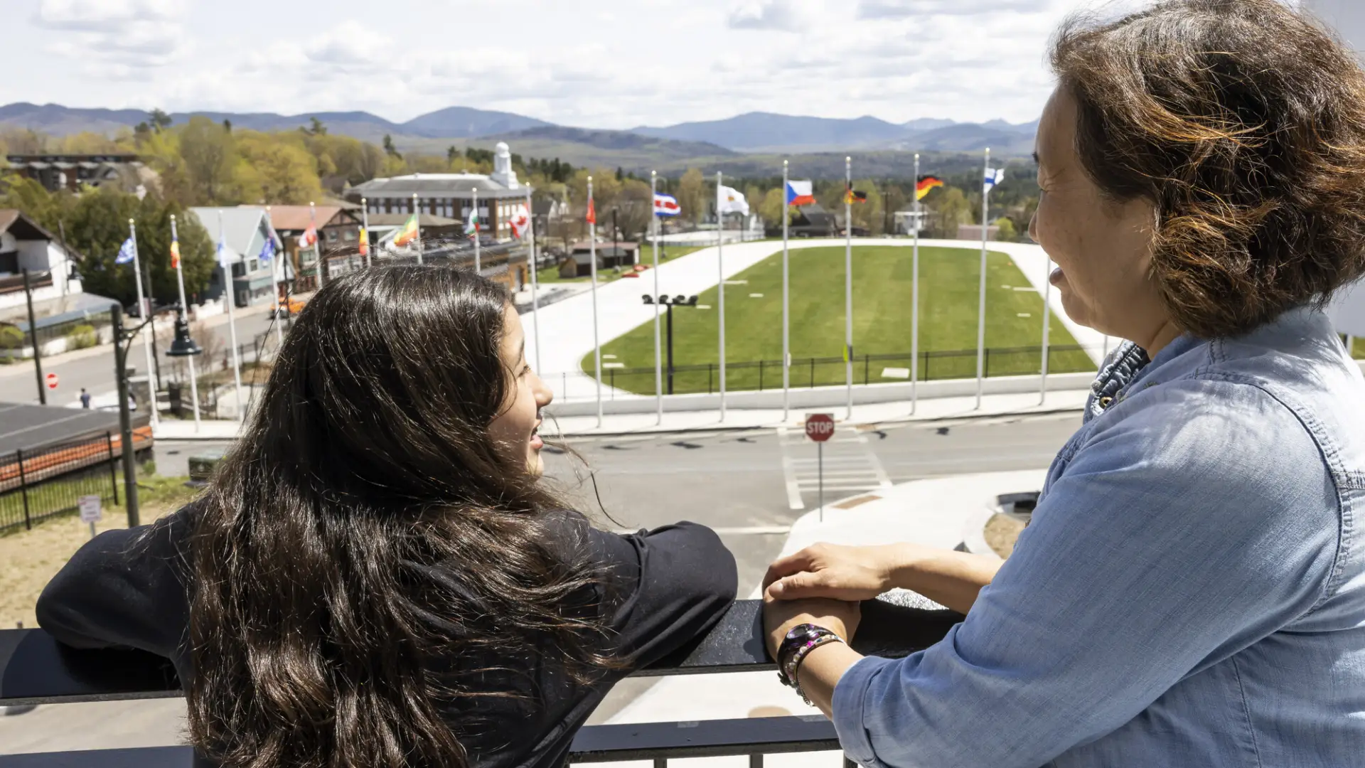 A mother and daughter overlooking the Olympic Oval.