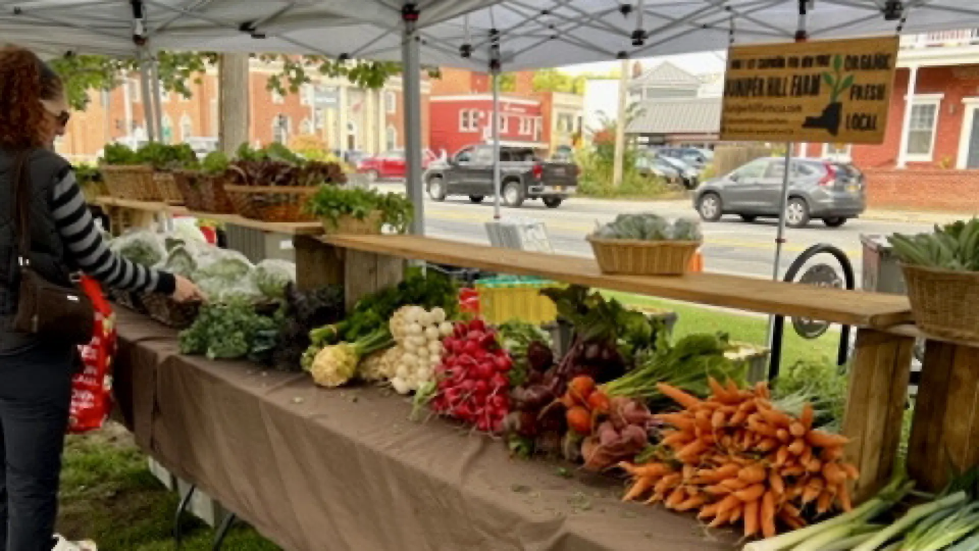 A tent filled with fall harvest