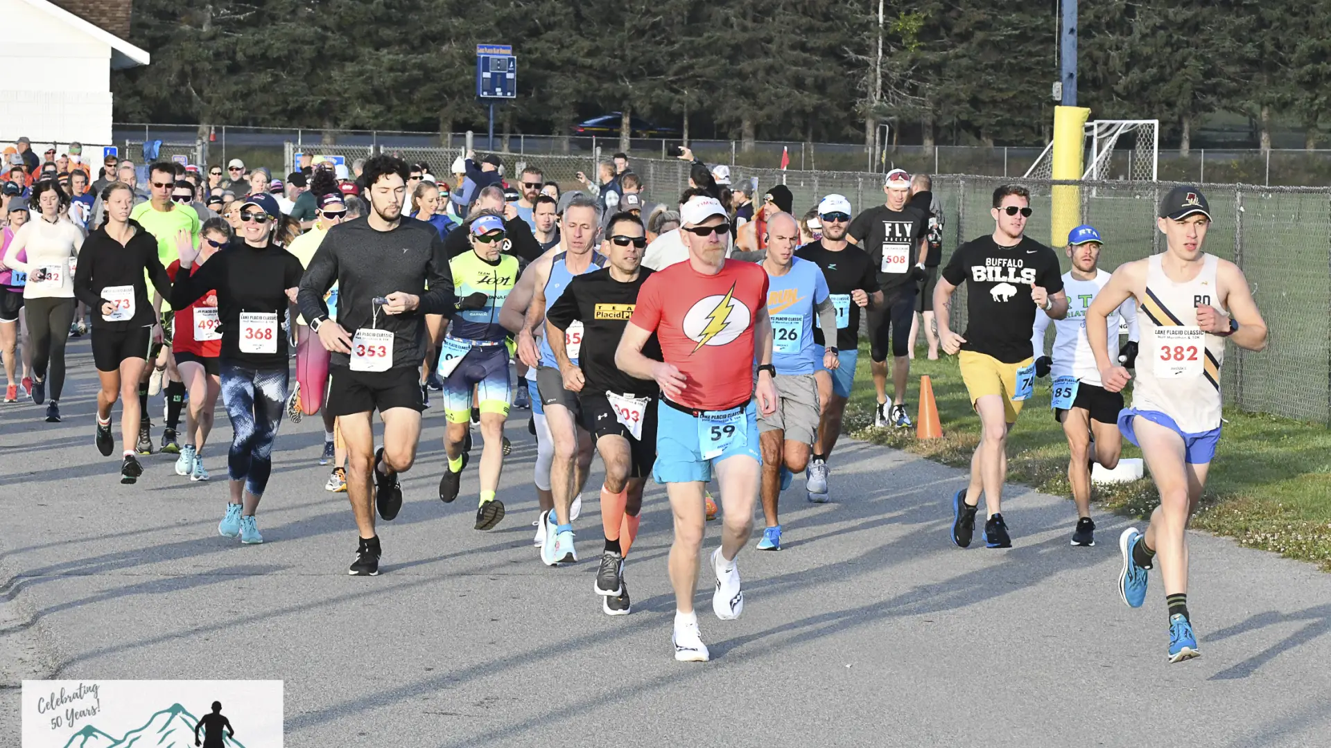 Participants run at the horse show grounds in the Lake Placid Classic half marathon