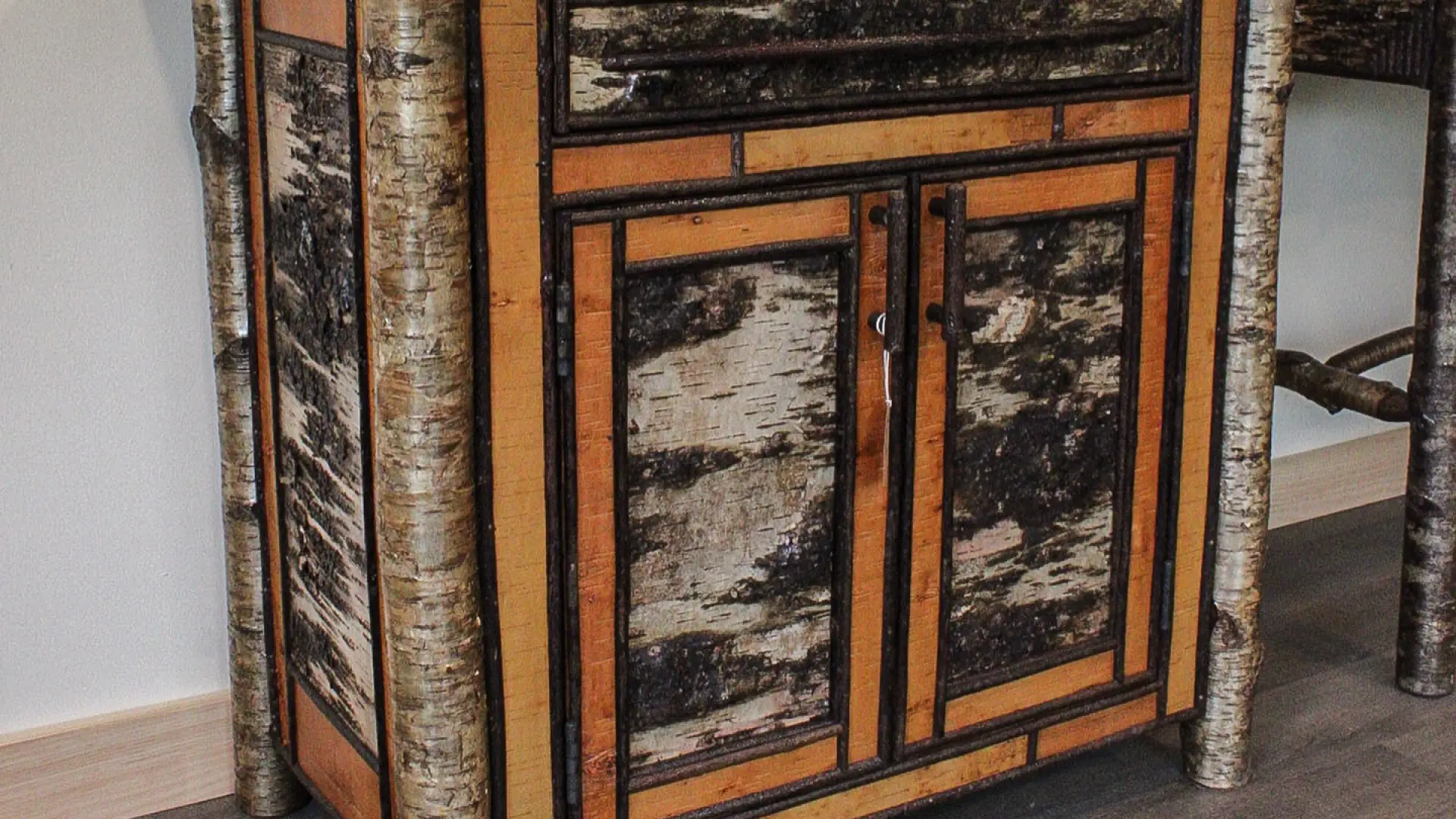 White birch cabinet with wooden stick pulls