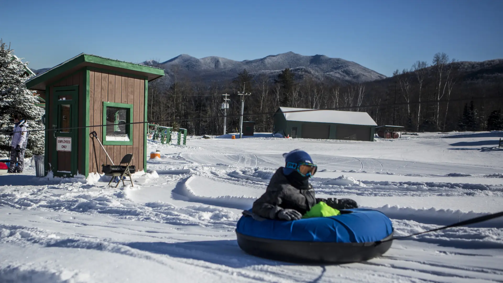 A tuber at the bottom of a run at Mt Pisgah