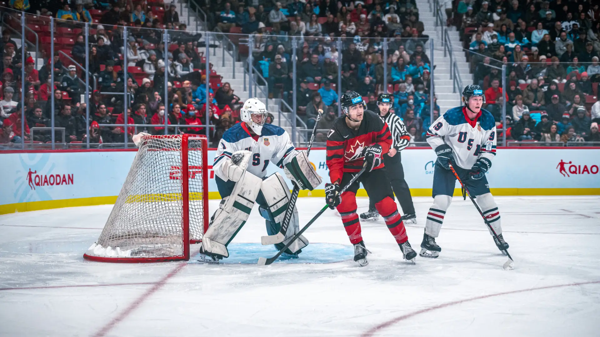 Hockey players on ice.