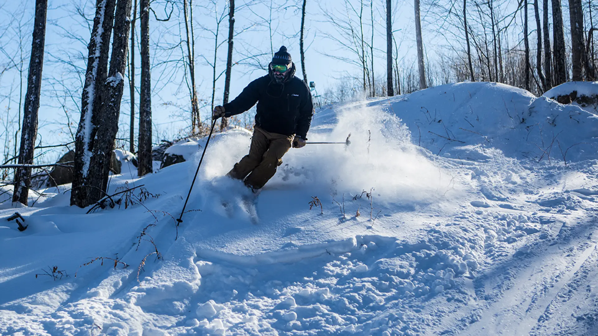 A skier doing side hits at Mt Pisgah