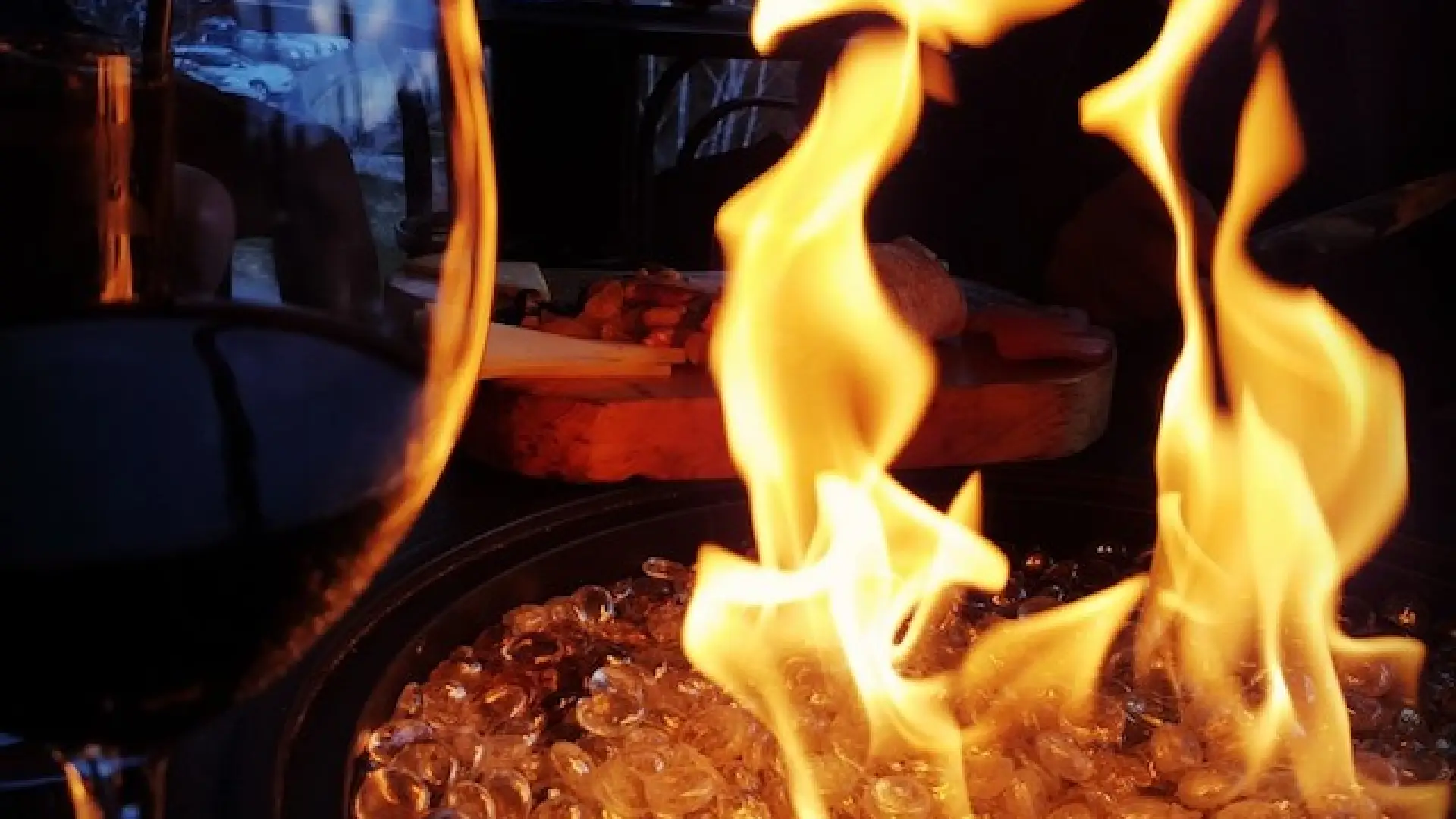 The joys of a chilly night, a firepit, and a fine beverage is part of an Adirondack fall experience.