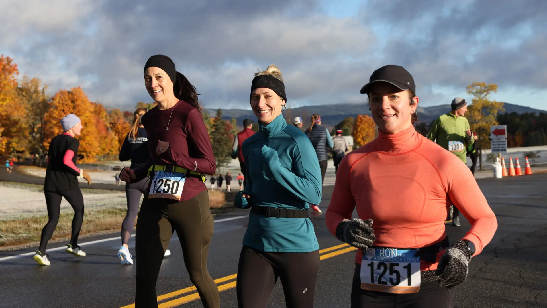 trio of athletes run together