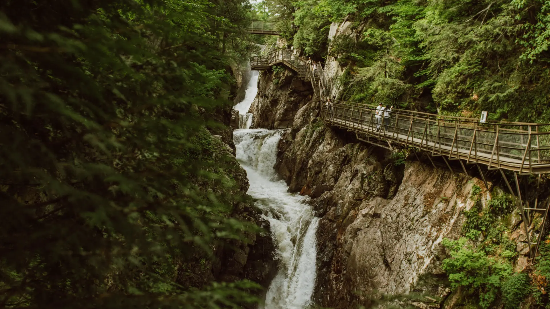 A couple exploring High Falls Gorge.