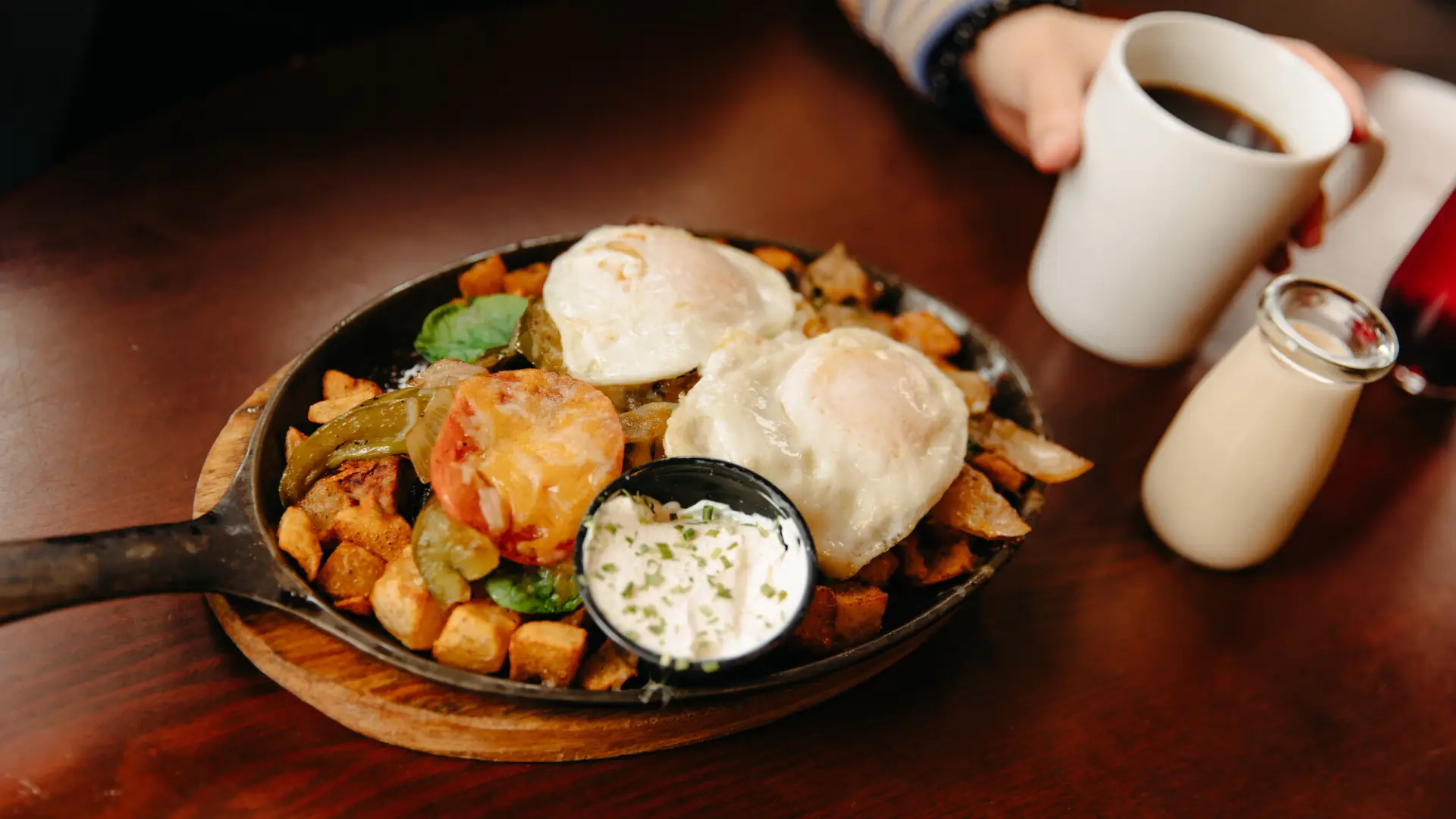 A cast iron skillet breakfast platter.