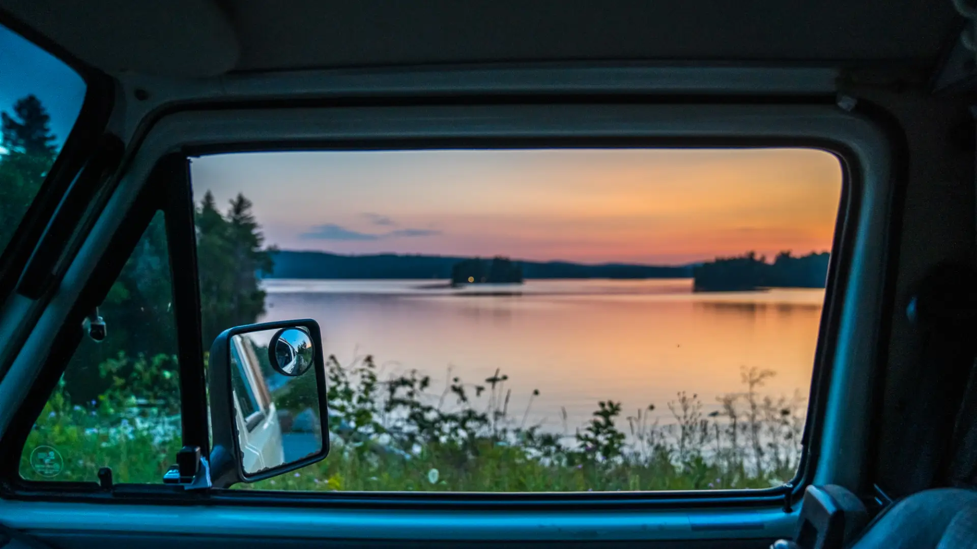 Lake views from a car window.