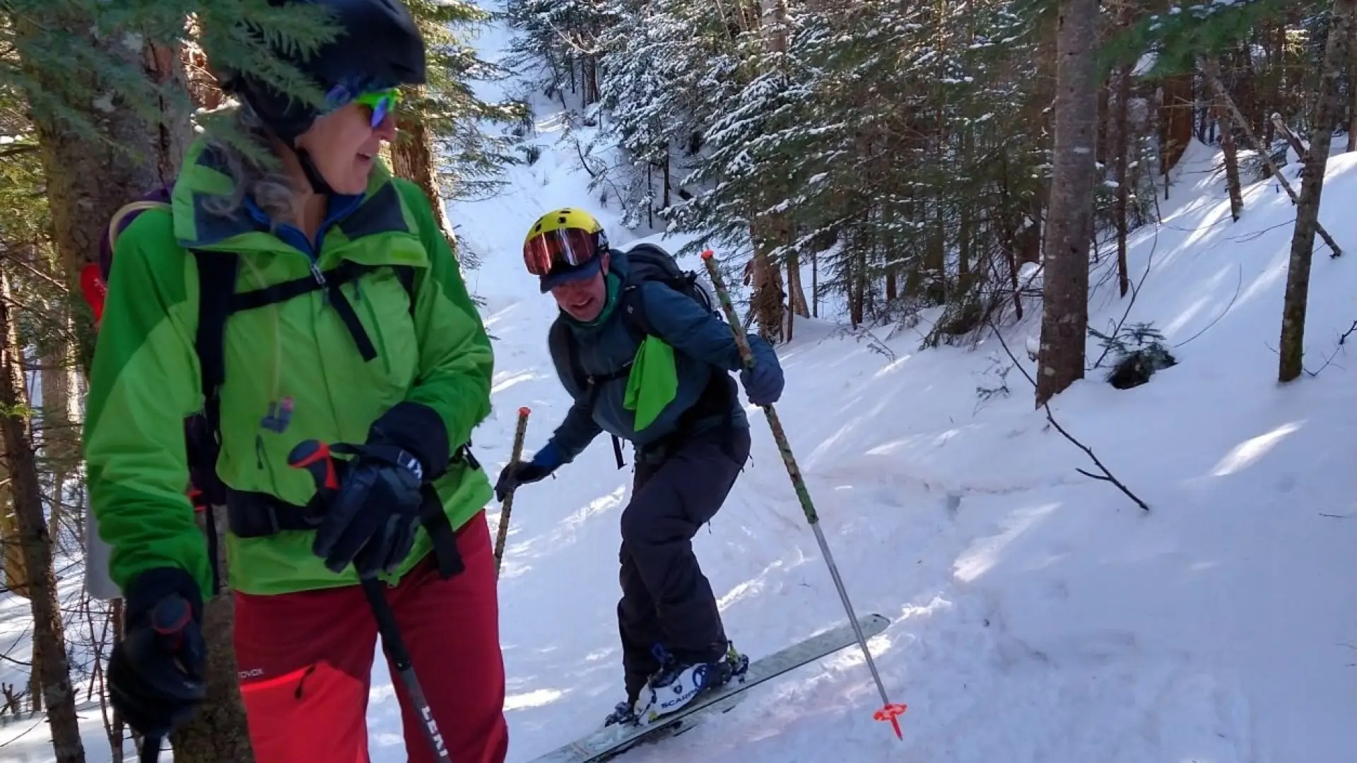 Group of back country skiers ascend a hill