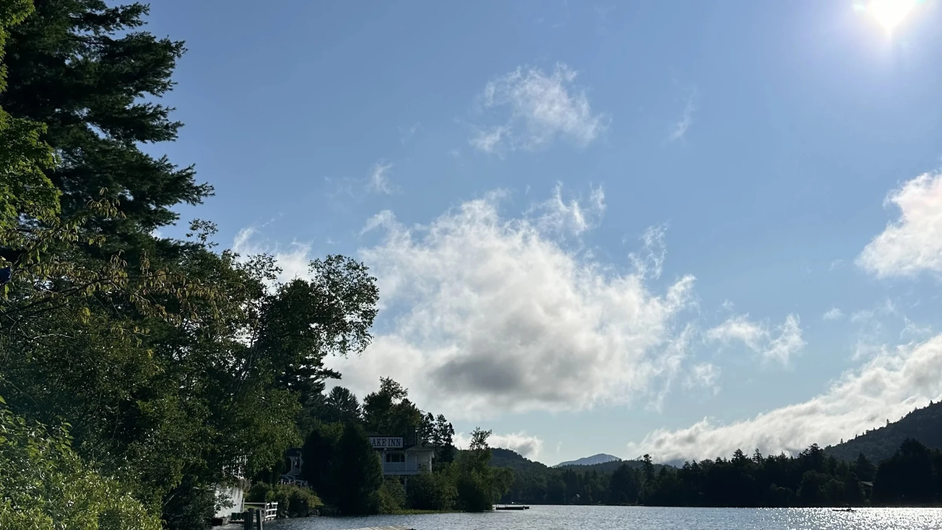 People participating in SUP yoga on Mirror Lake