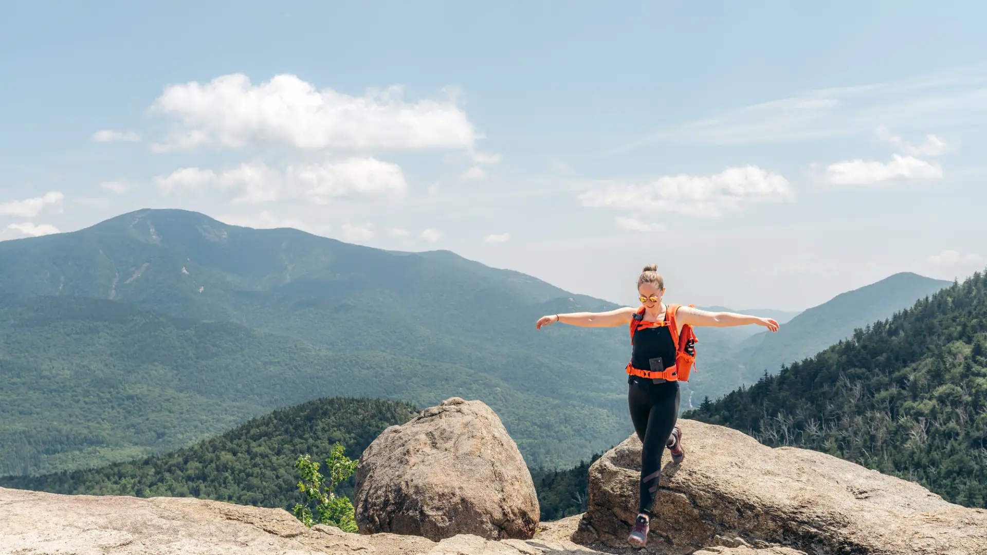A hiker on a rocky summit