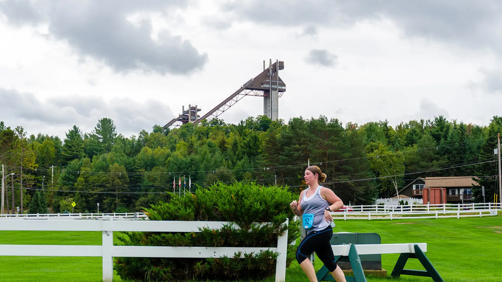 Runner with the ski jumps in the background