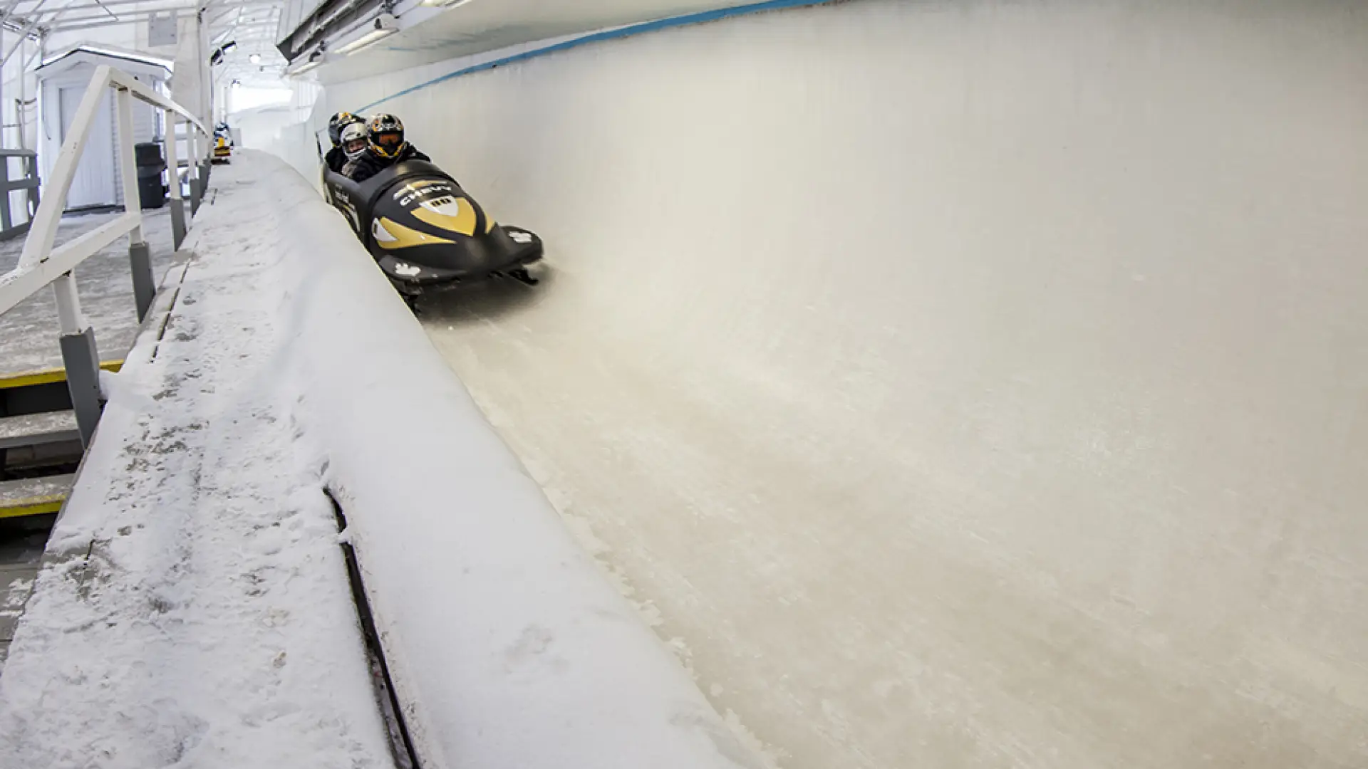 Bobsled passenger ride coming down the track