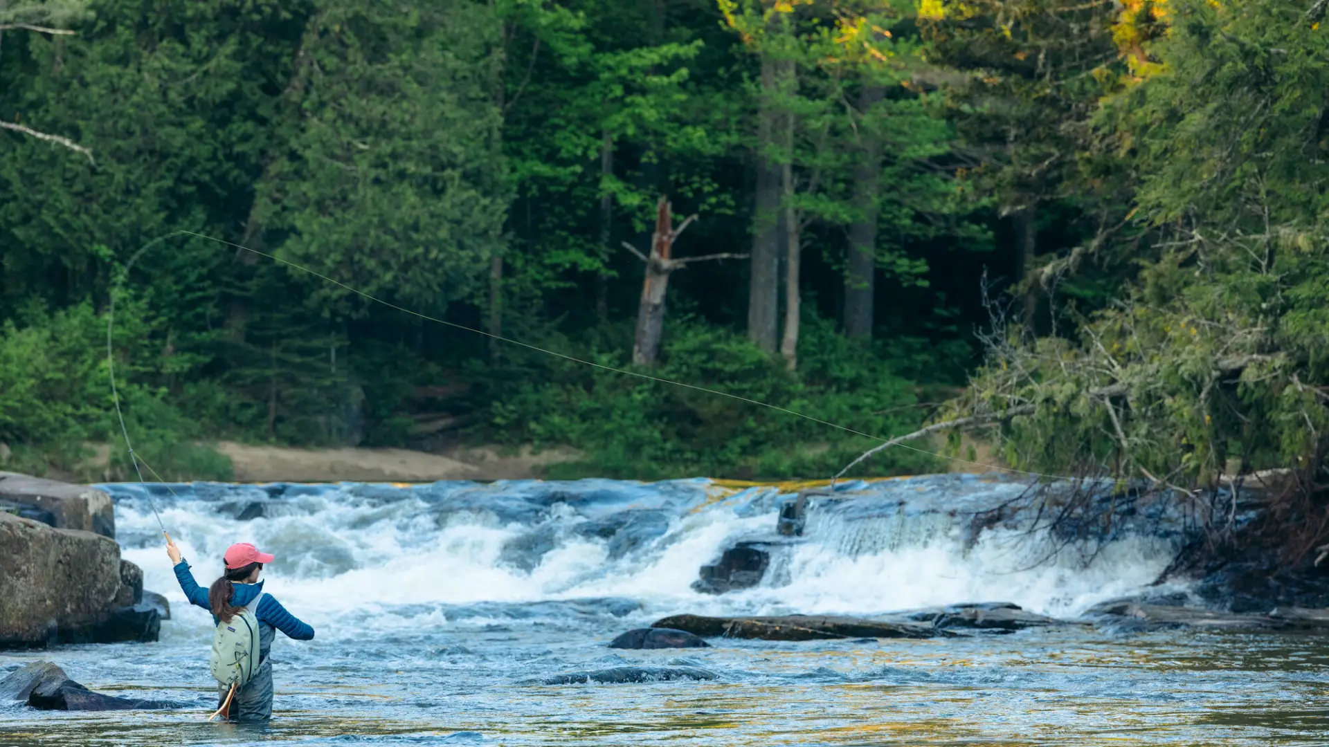 A fly fishers casting