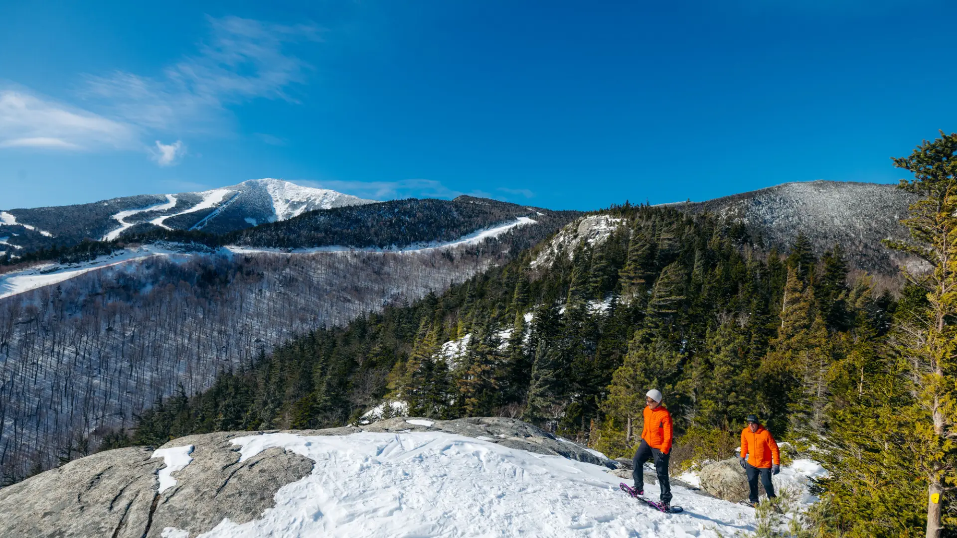 Two people on Bear Den in the winter