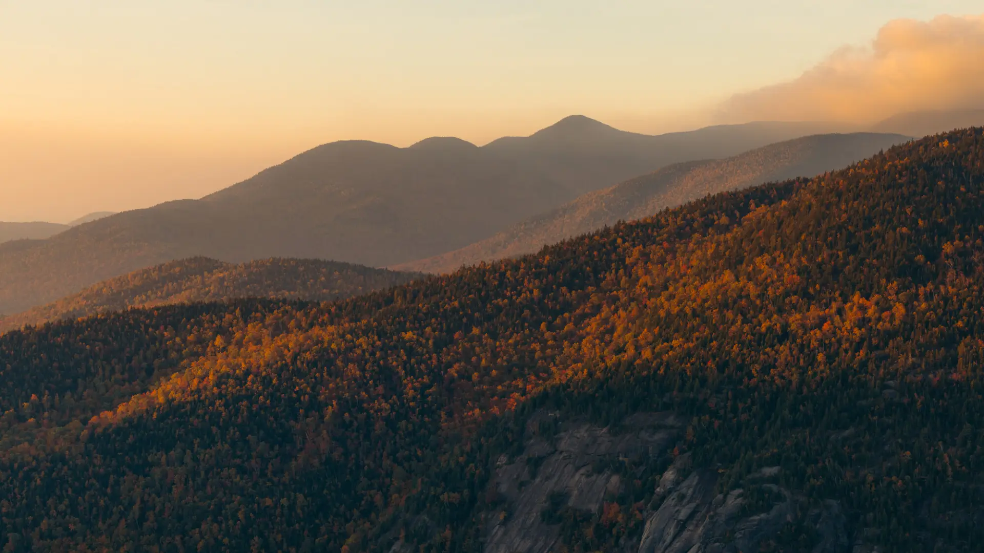 The view of tall mountains in the fall