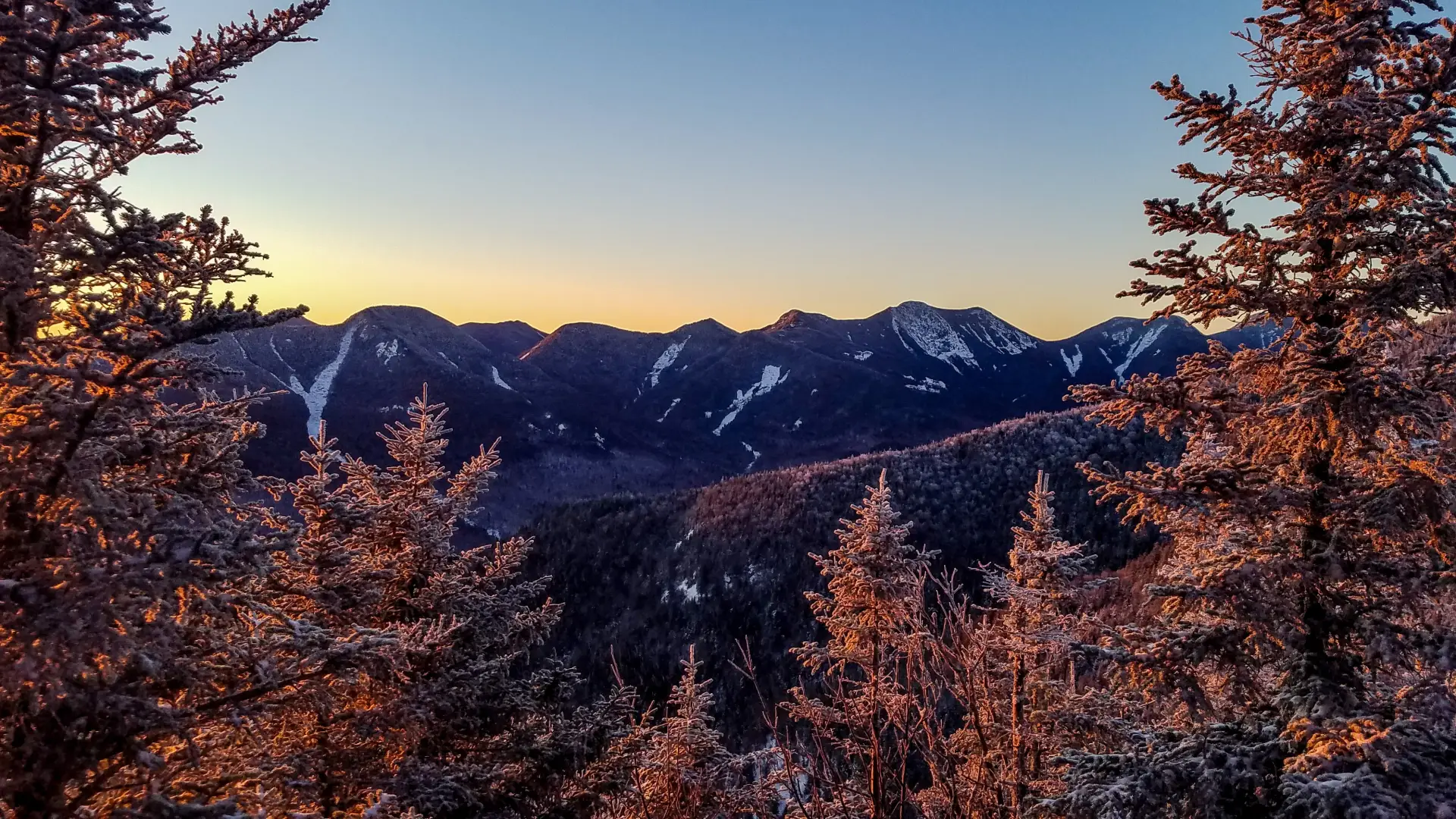 An early morning view of mountains in the winter
