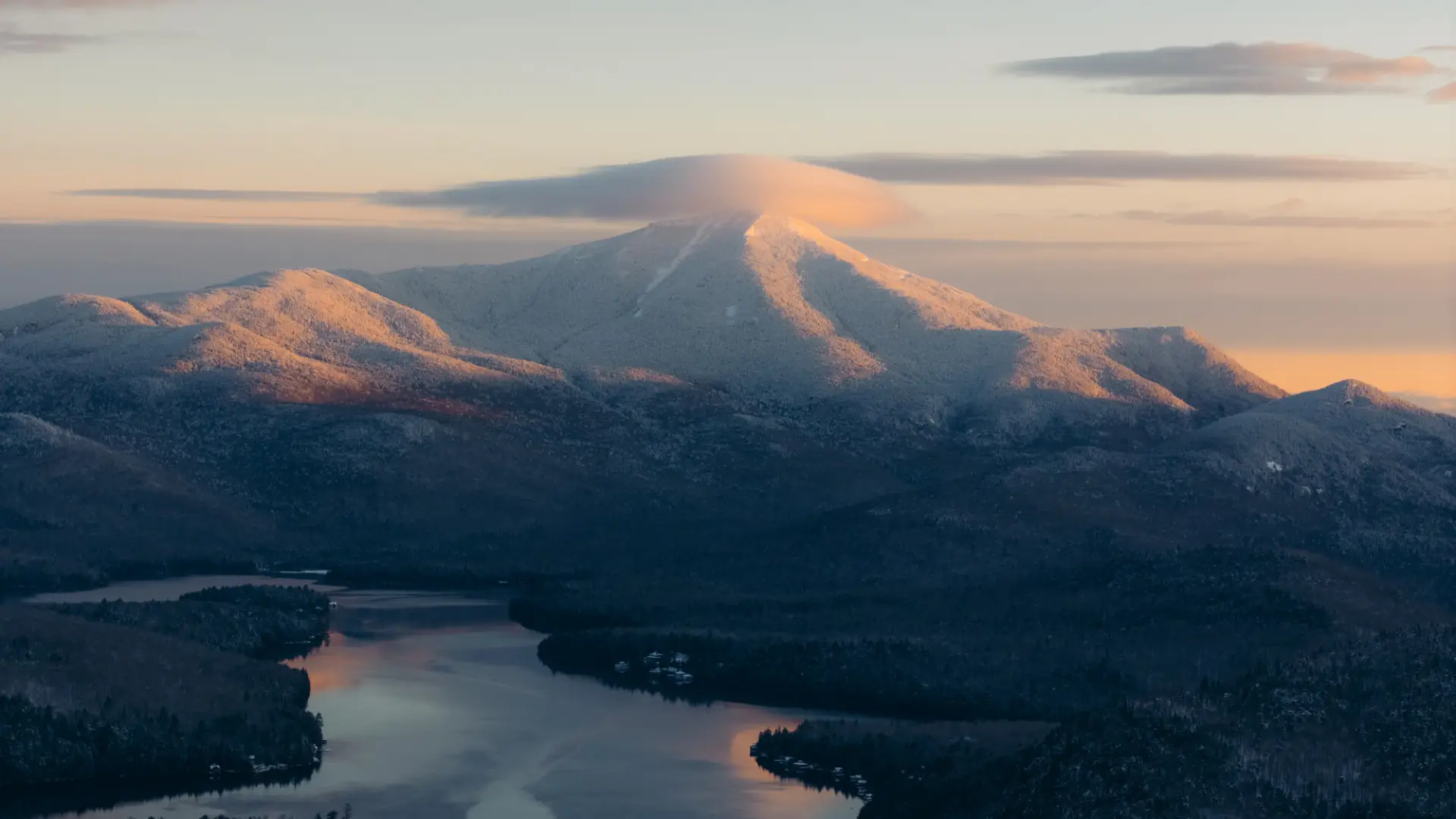 Aerial view of Mirror Lake and Whiteface Mountain during the winter