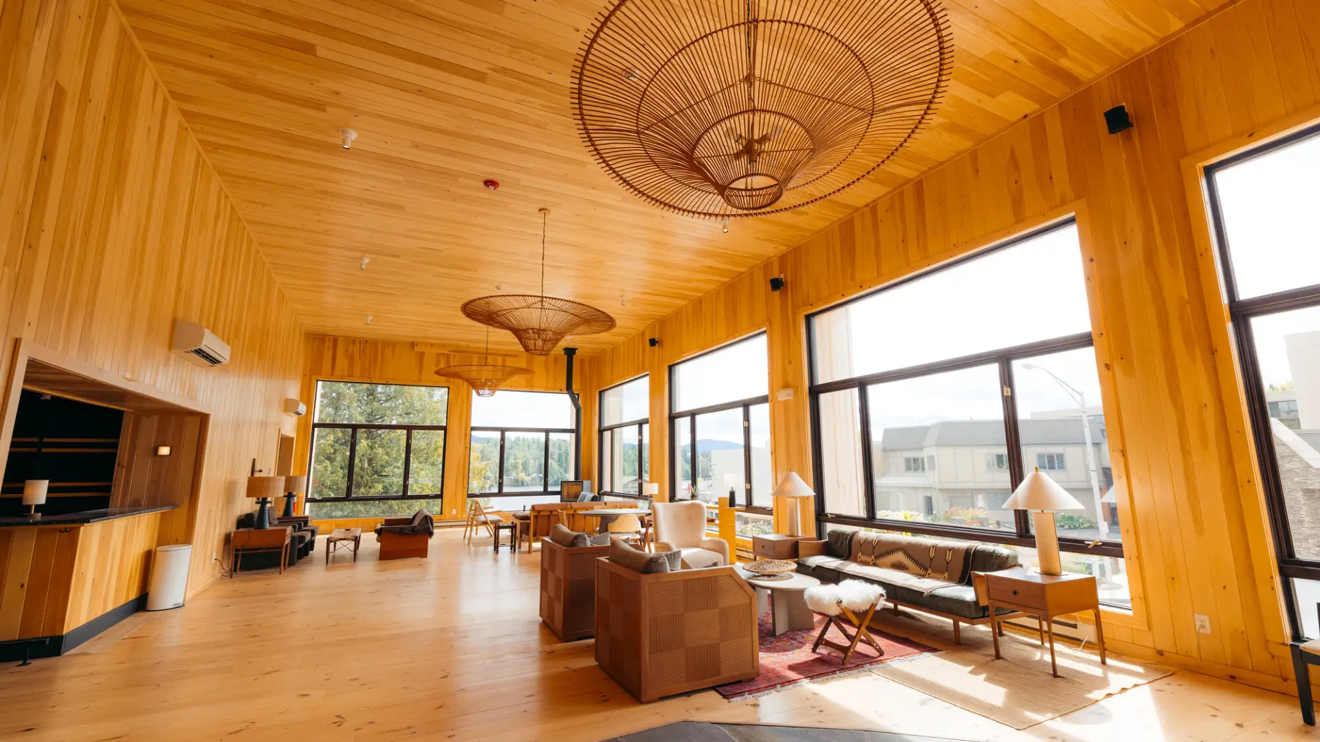 open common area with heavy wood themes and high cielings.