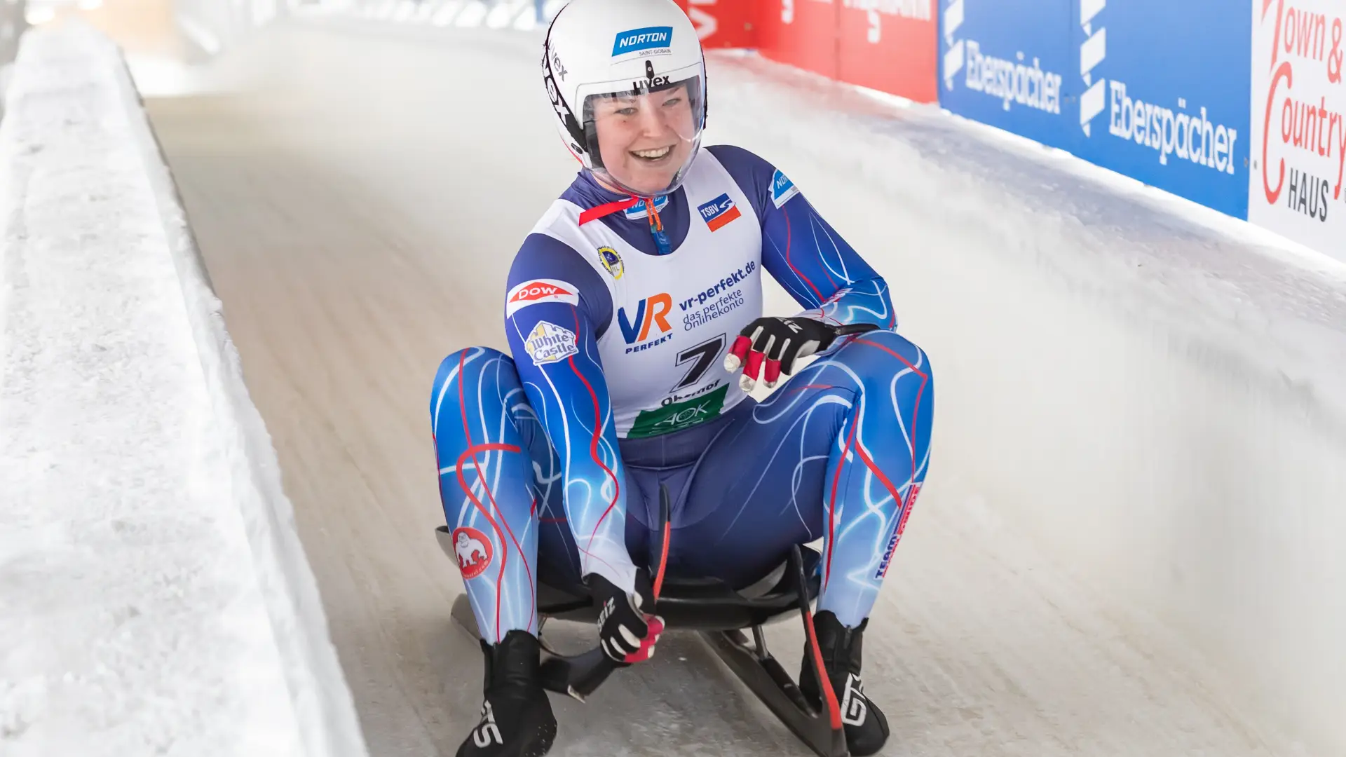 Ashley smiles as she slows her self down at the end of the course