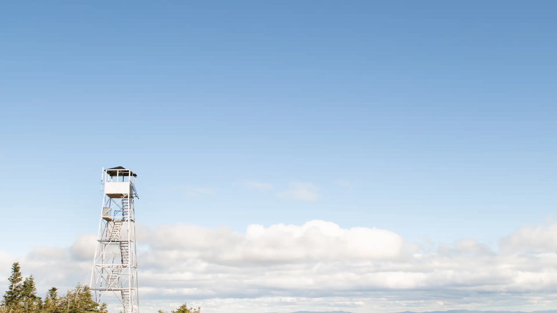 A firetower on top of a mountain