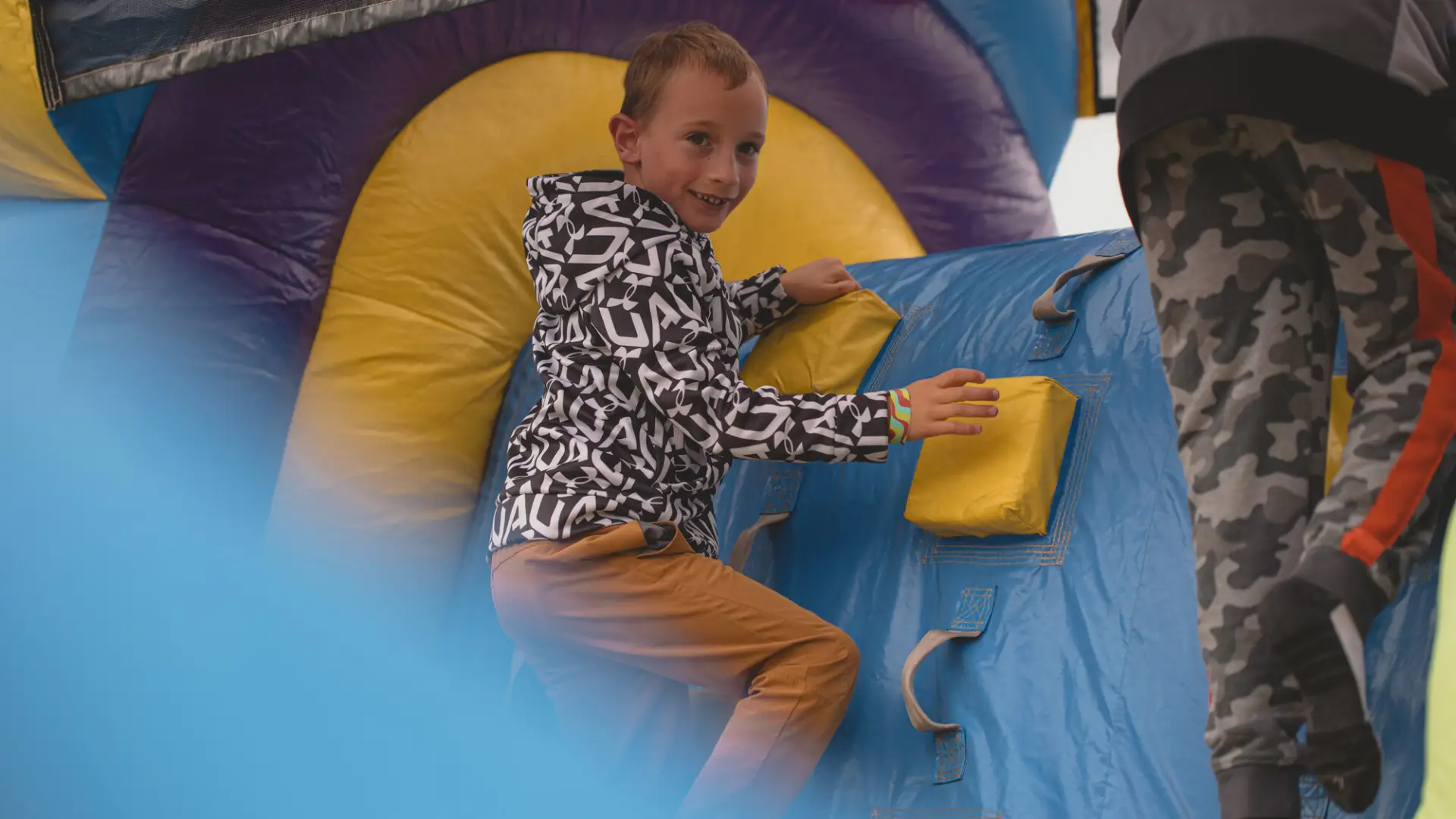 Child in a bounce house at Tupper Lake's fall festival